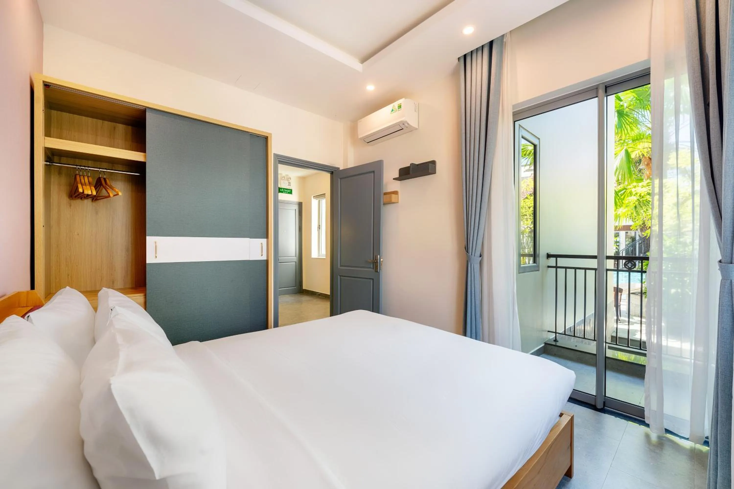 Bed in Full Moon Apartments & Villa - Hoi An