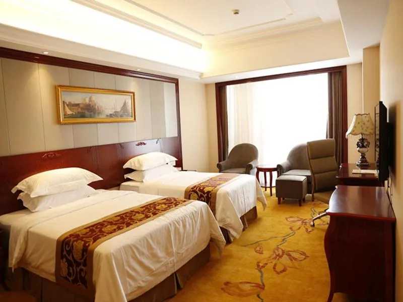 Bed in Vienna International Hotel Shanghai Hongqiao Airport Convention and Exhibition Center Huaxu Highway