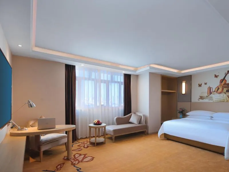 Bed in Vienna International Hotel FuJian PuTian Pearl