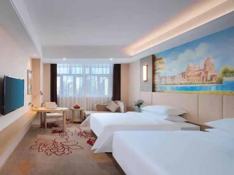 Bed in Vienna International Hotel FuJian PuTian Pearl