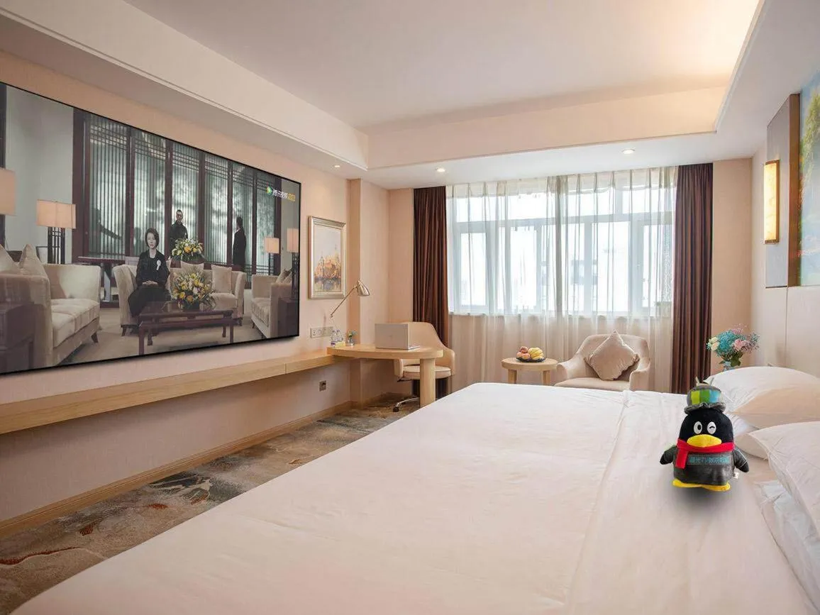 Bed in Vienna International Hotel FuJian PuTian Pearl
