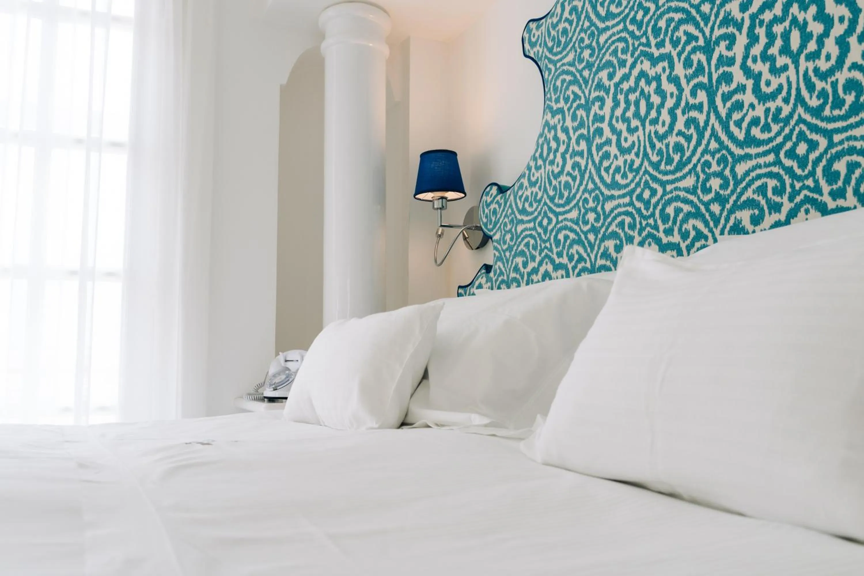 Bed in Villa Boheme Exclusive Luxury Suites