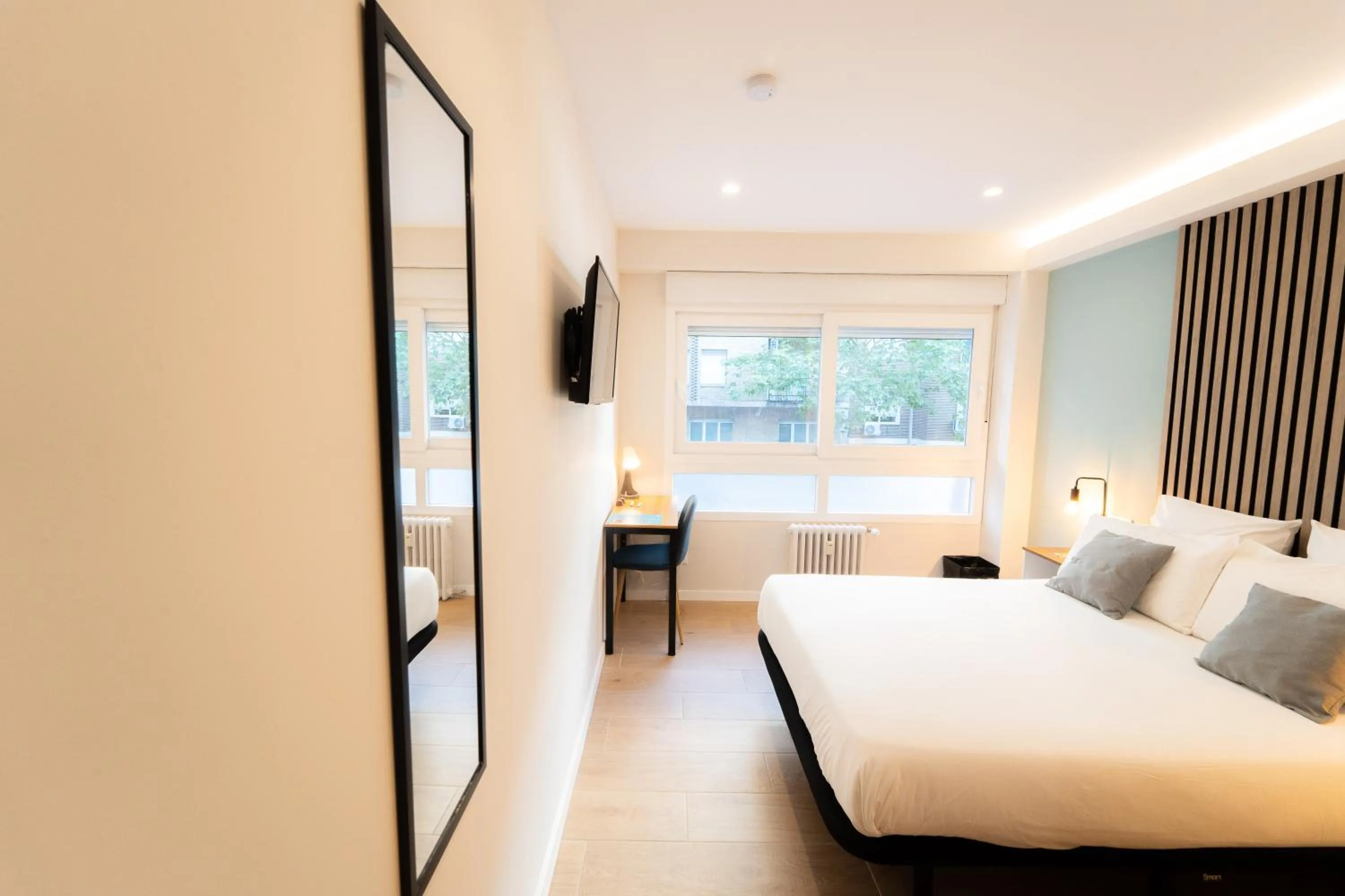 Bed in I'M Room Suites Nuevos Ministerios - Bernabeu 'Digital Access'