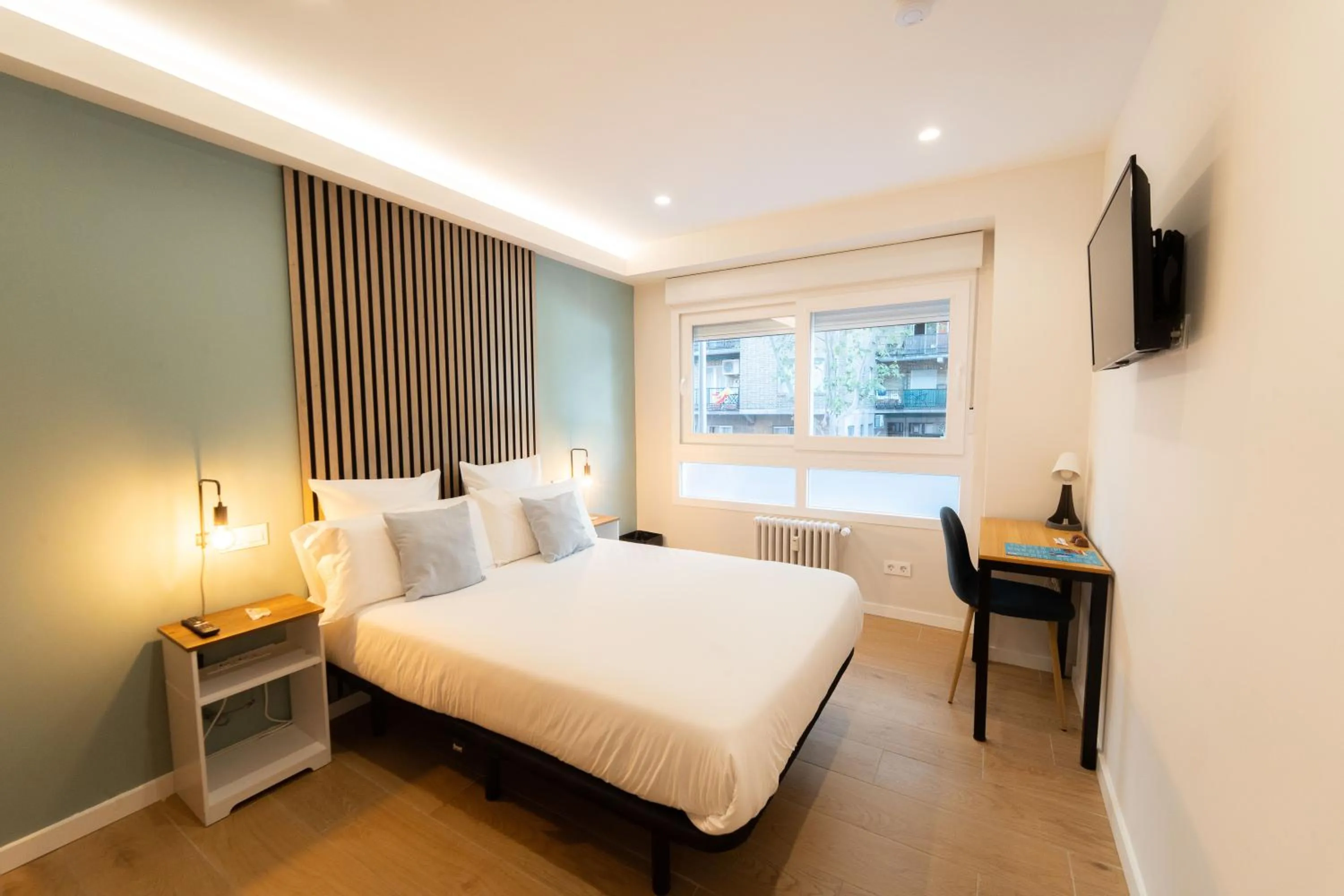 Bed in I'M Room Suites Nuevos Ministerios - Bernabeu 'Digital Access'