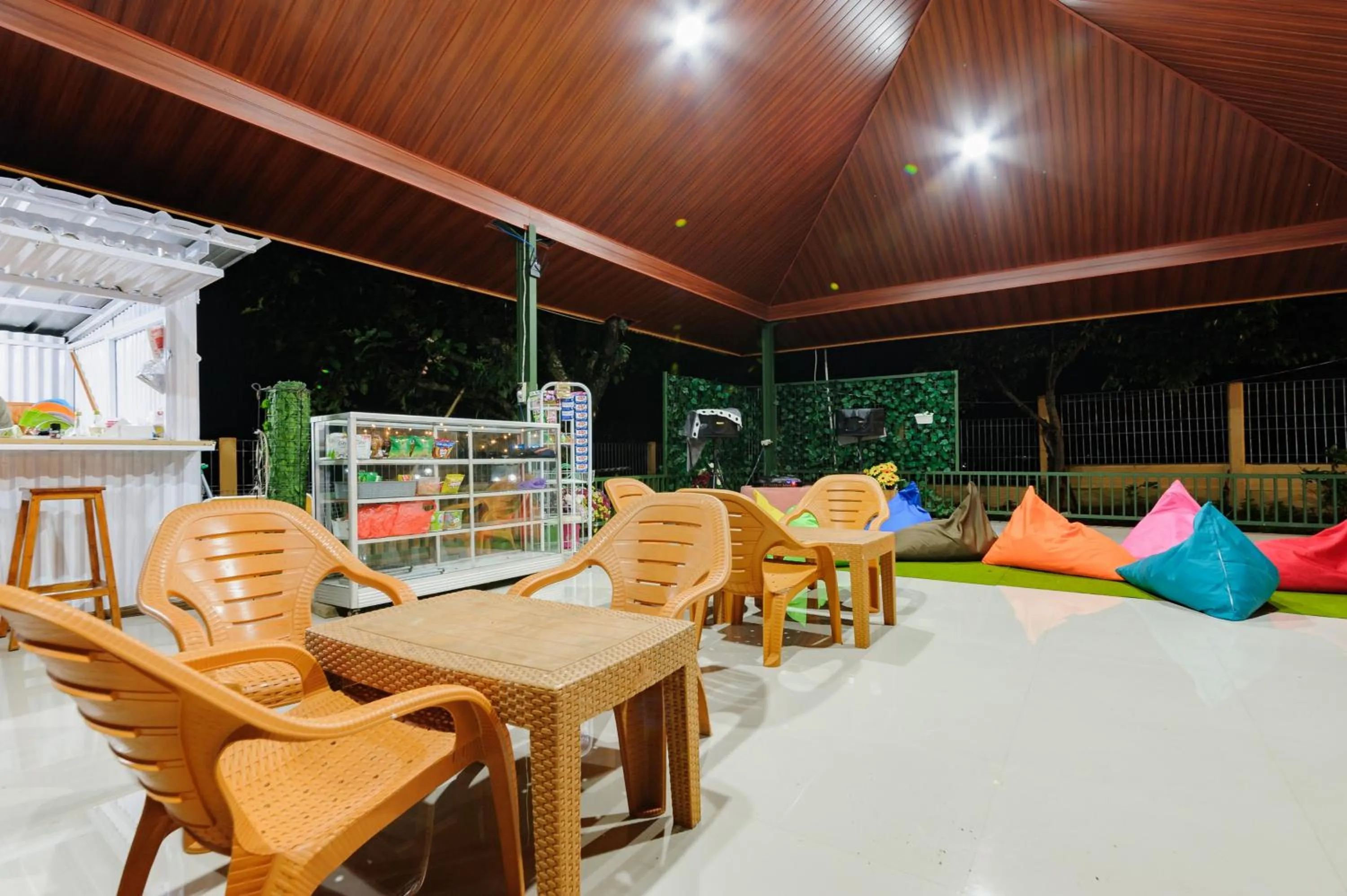 Seating area in Urbanview Hotel Nerine's Glamping Village Cipanas by RedDoorz