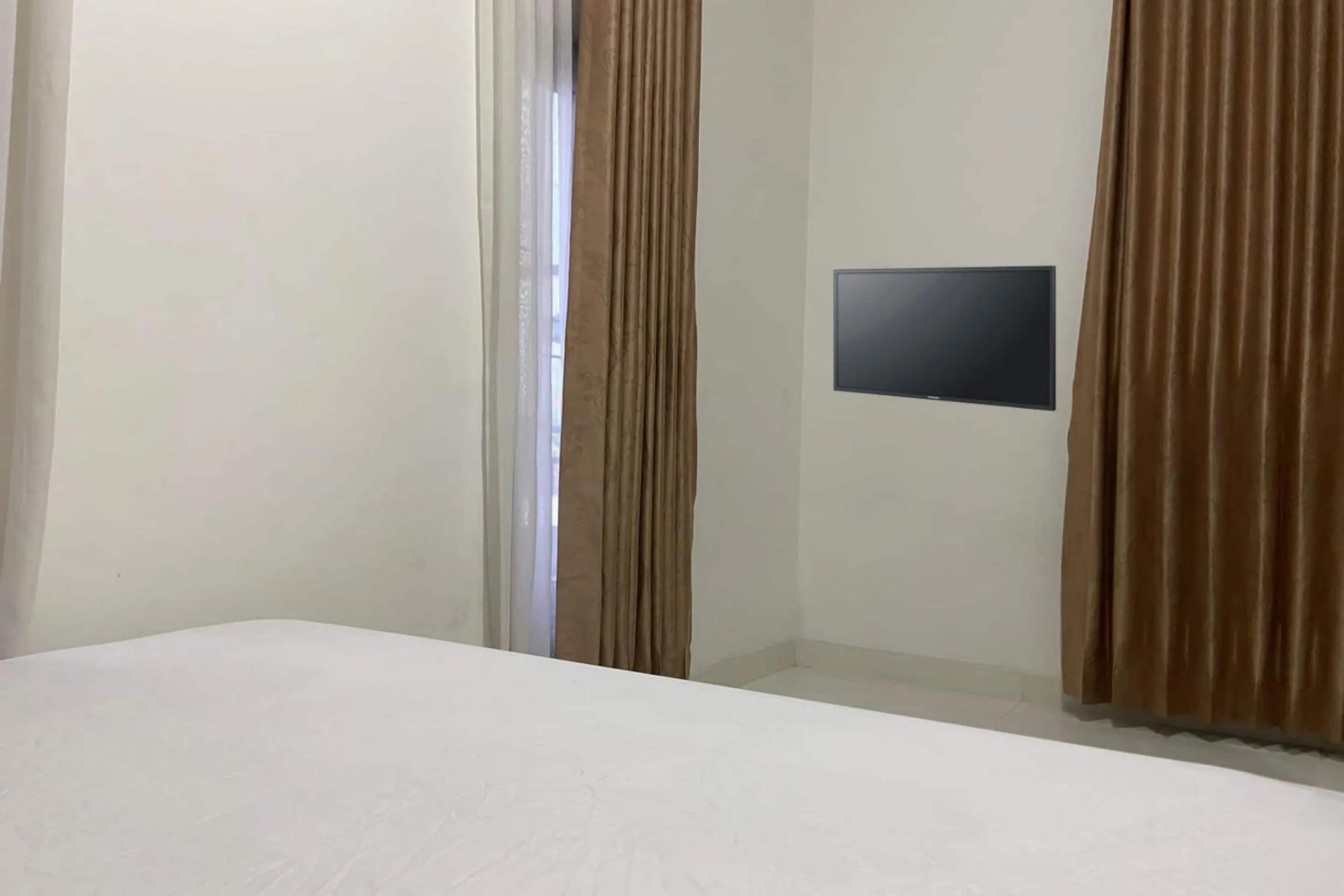 Bedroom, Bed in OYO 93485 Hotel Kenzie Sentani