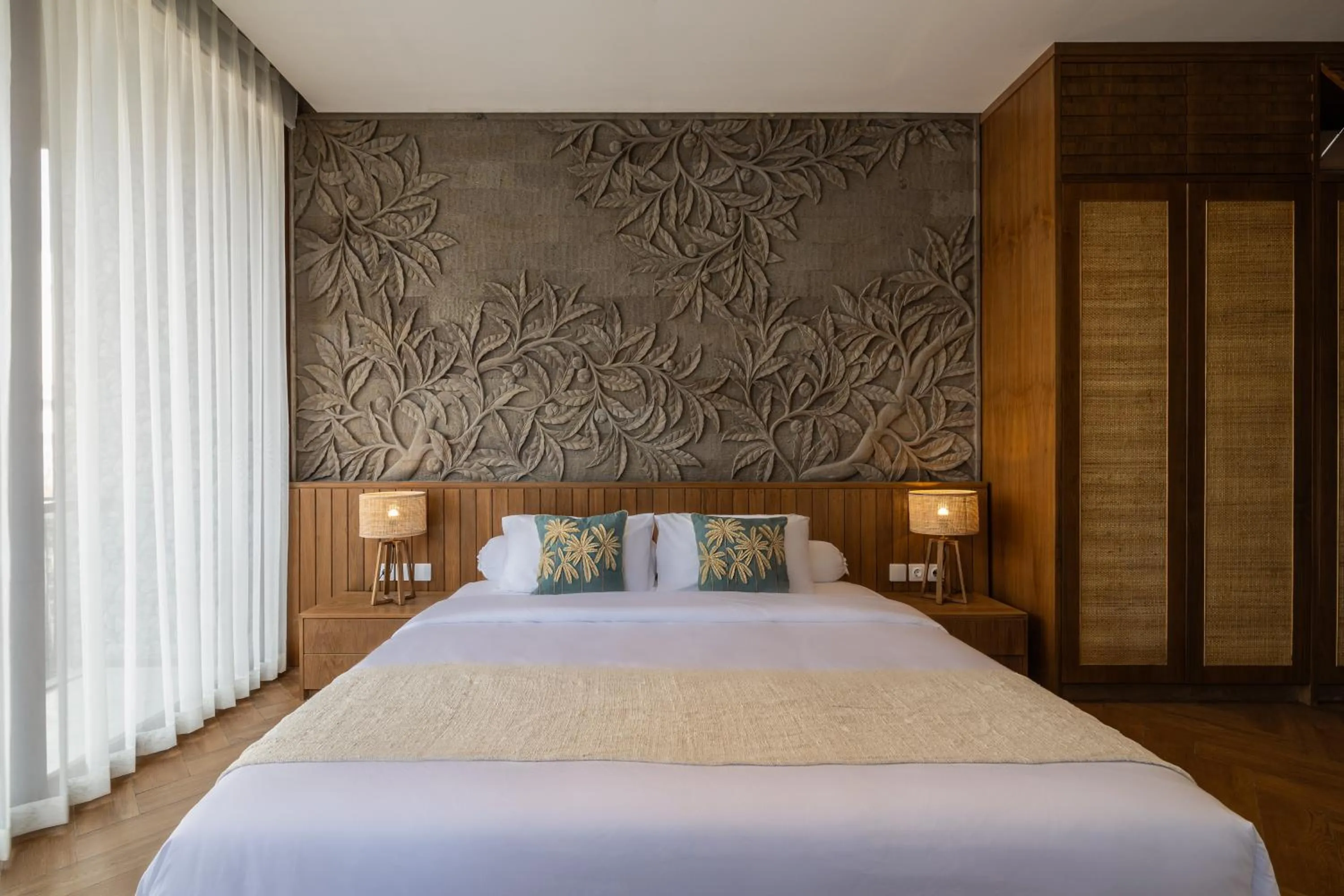 Bed in AMR Echo Beach Villa's Canggu