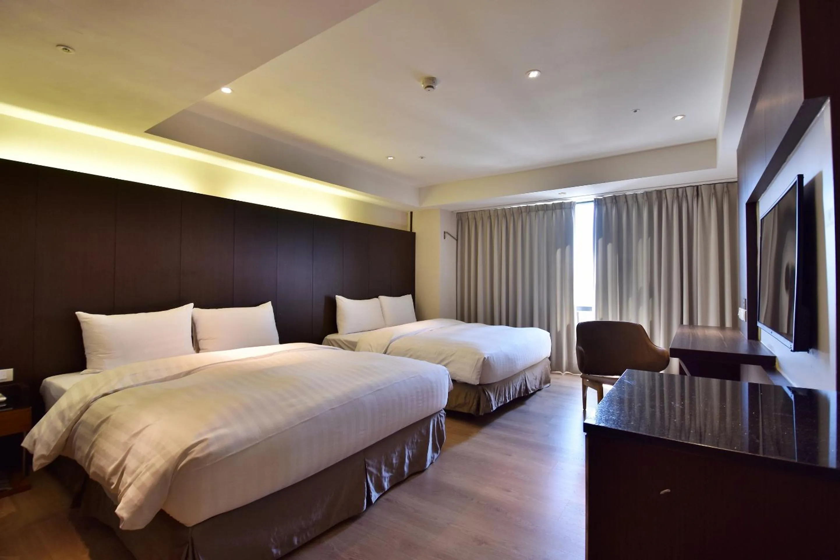 Photo of the whole room, Bed in HOTEL HI- Chui-Yang