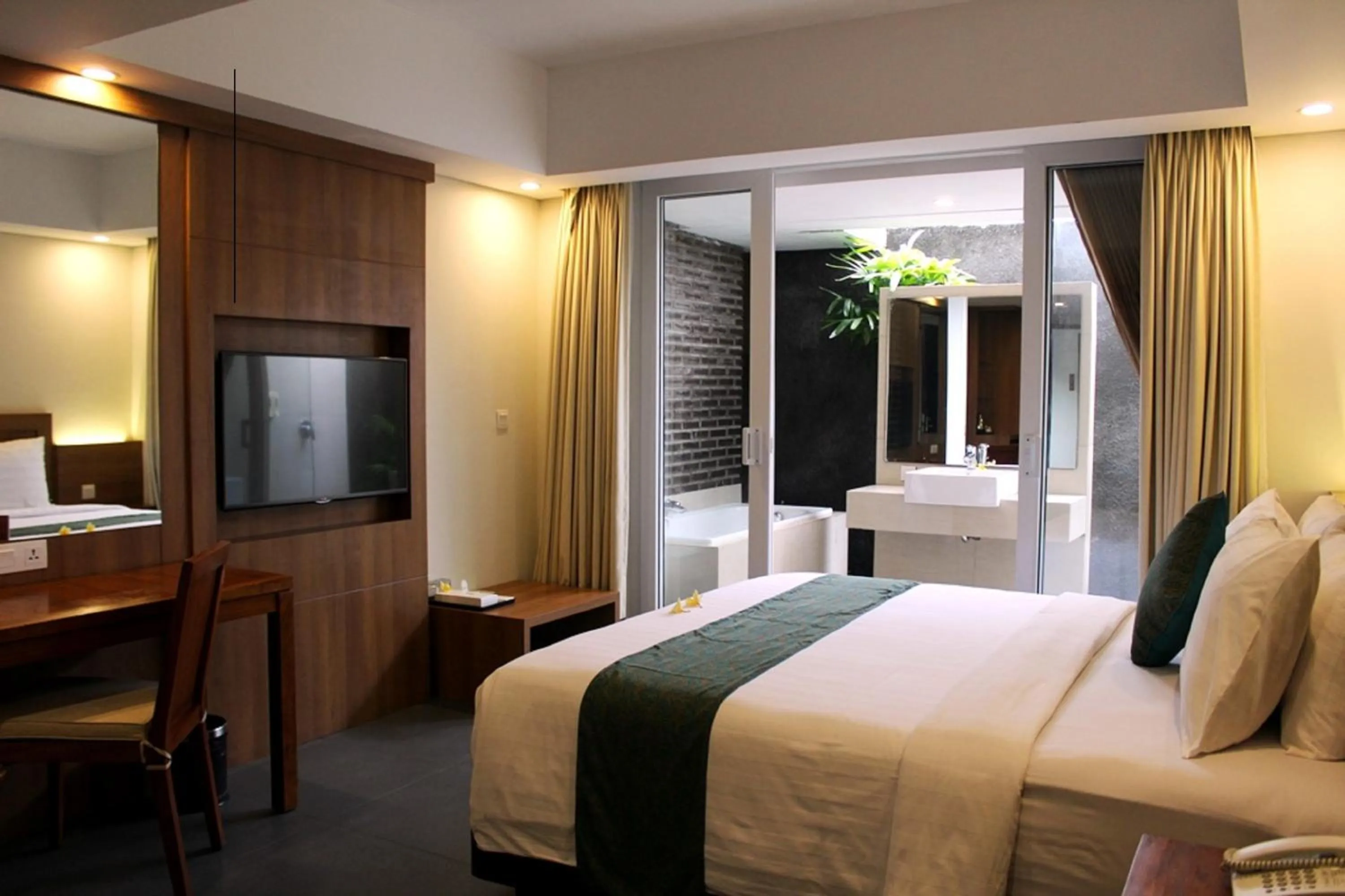 Living room, Bed in Paragon Hotel Seminyak