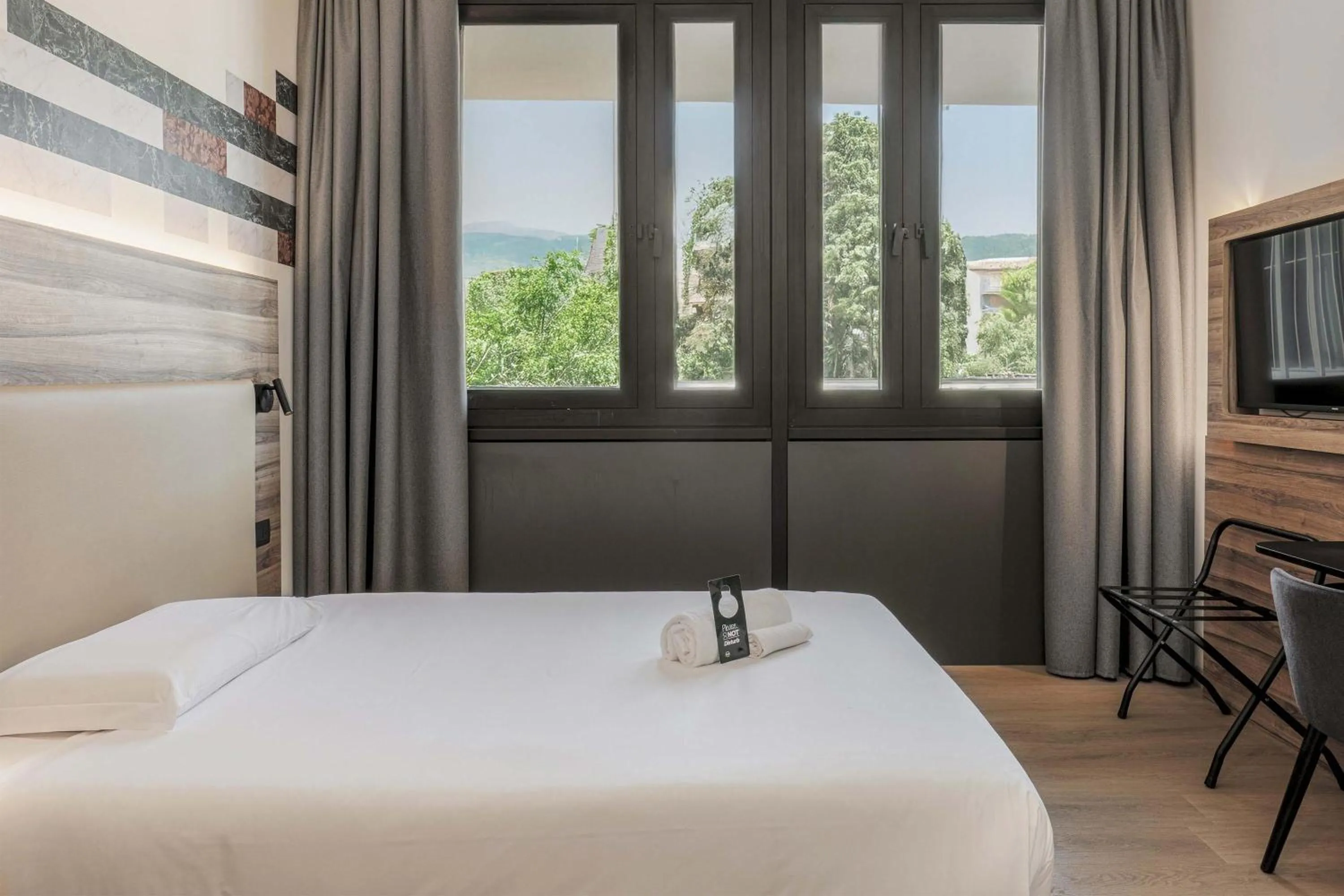 Photo of the whole room, Bed in B&B HOTEL Prato City Center