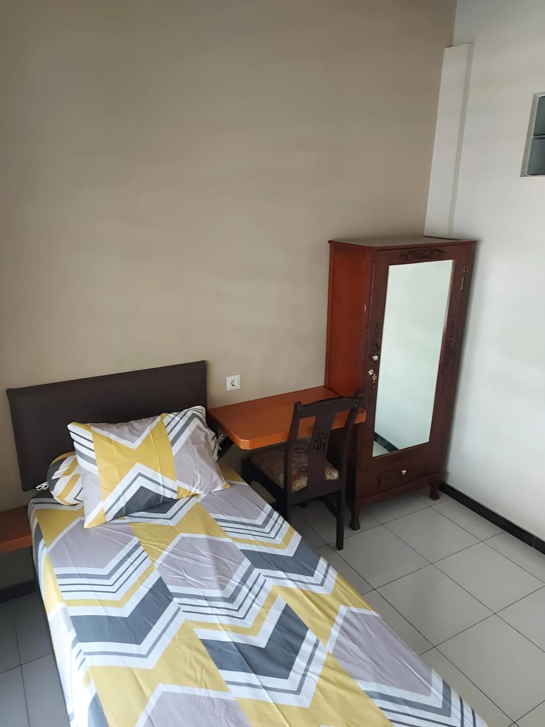 Bed in Penginapan PIP Semarang