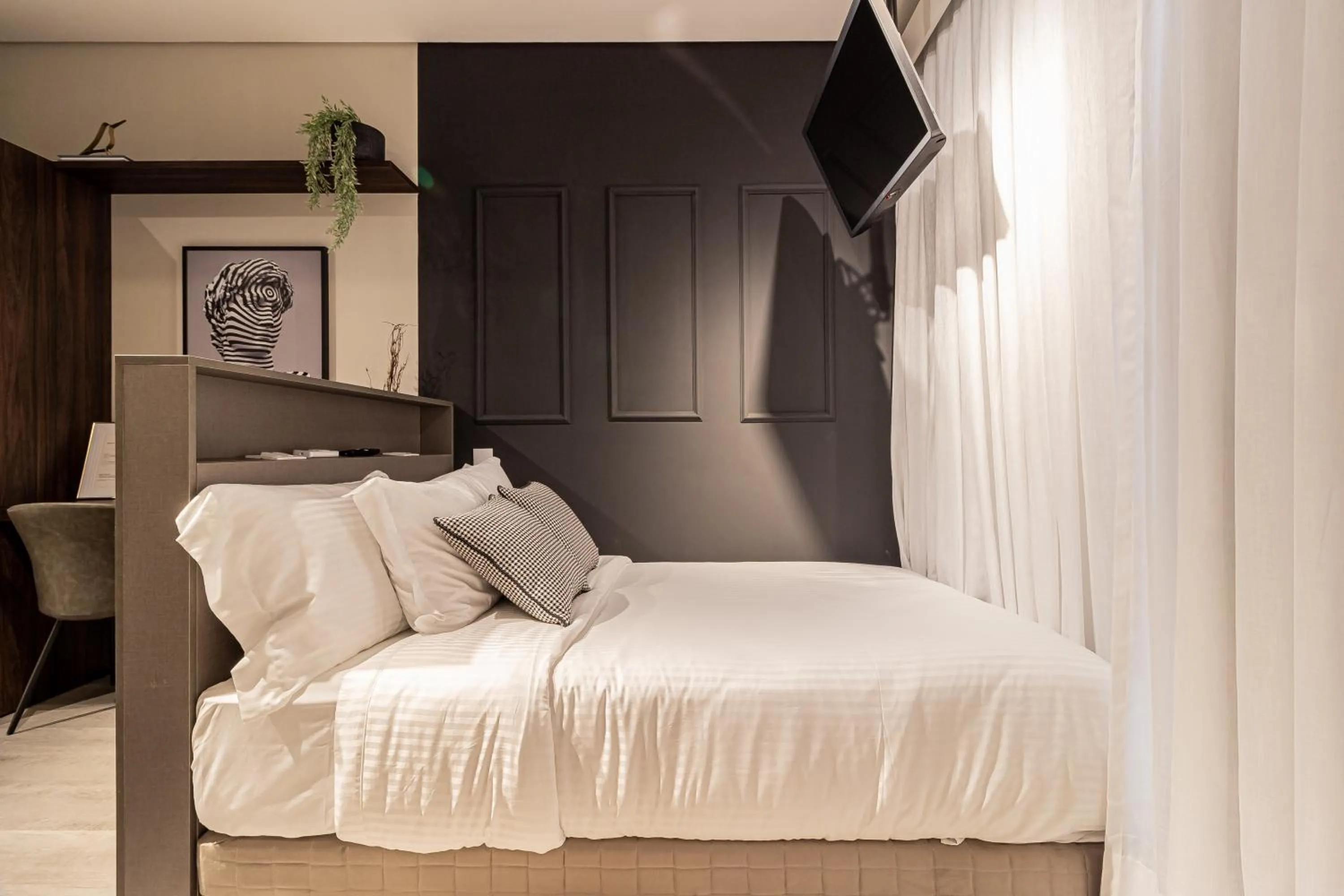 Bed in Iconyc Charlie Ibirapuera Hotel