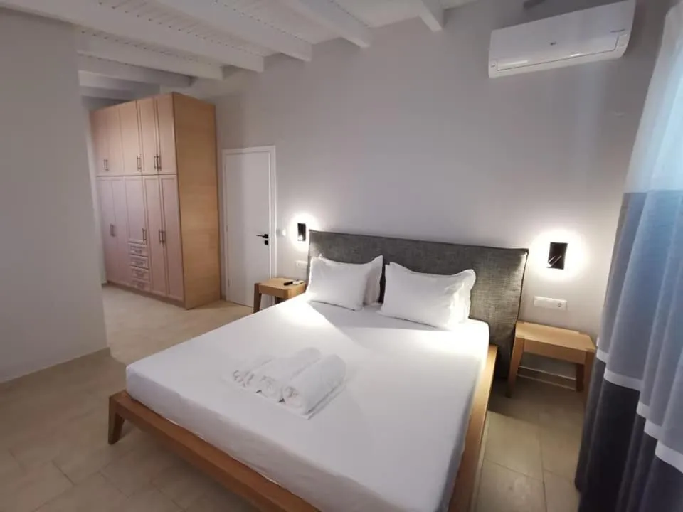 Bed in Ionion Beach Apartment Hotel & Spa