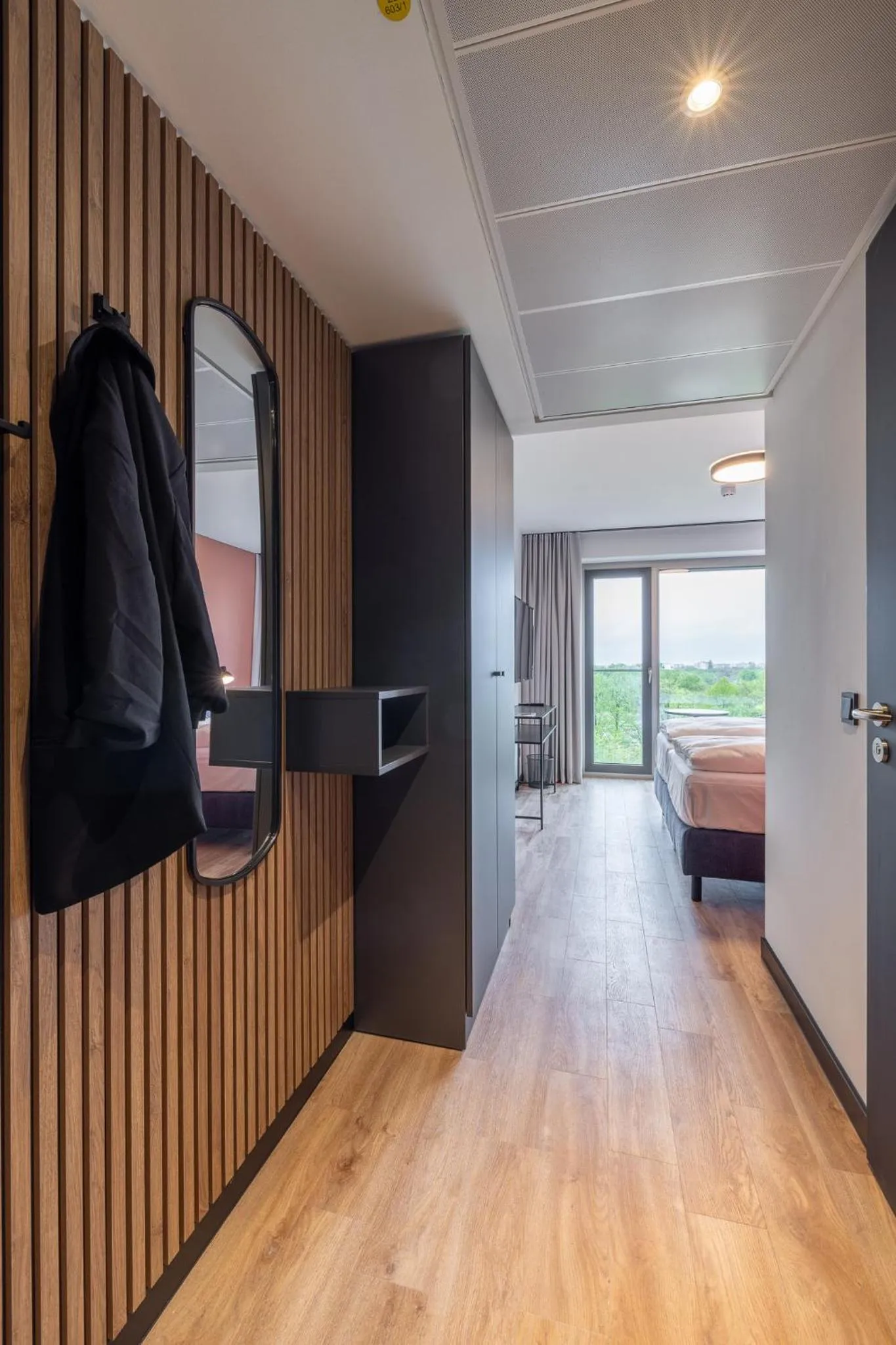 Photo of the whole room, Bed in The Base Munich