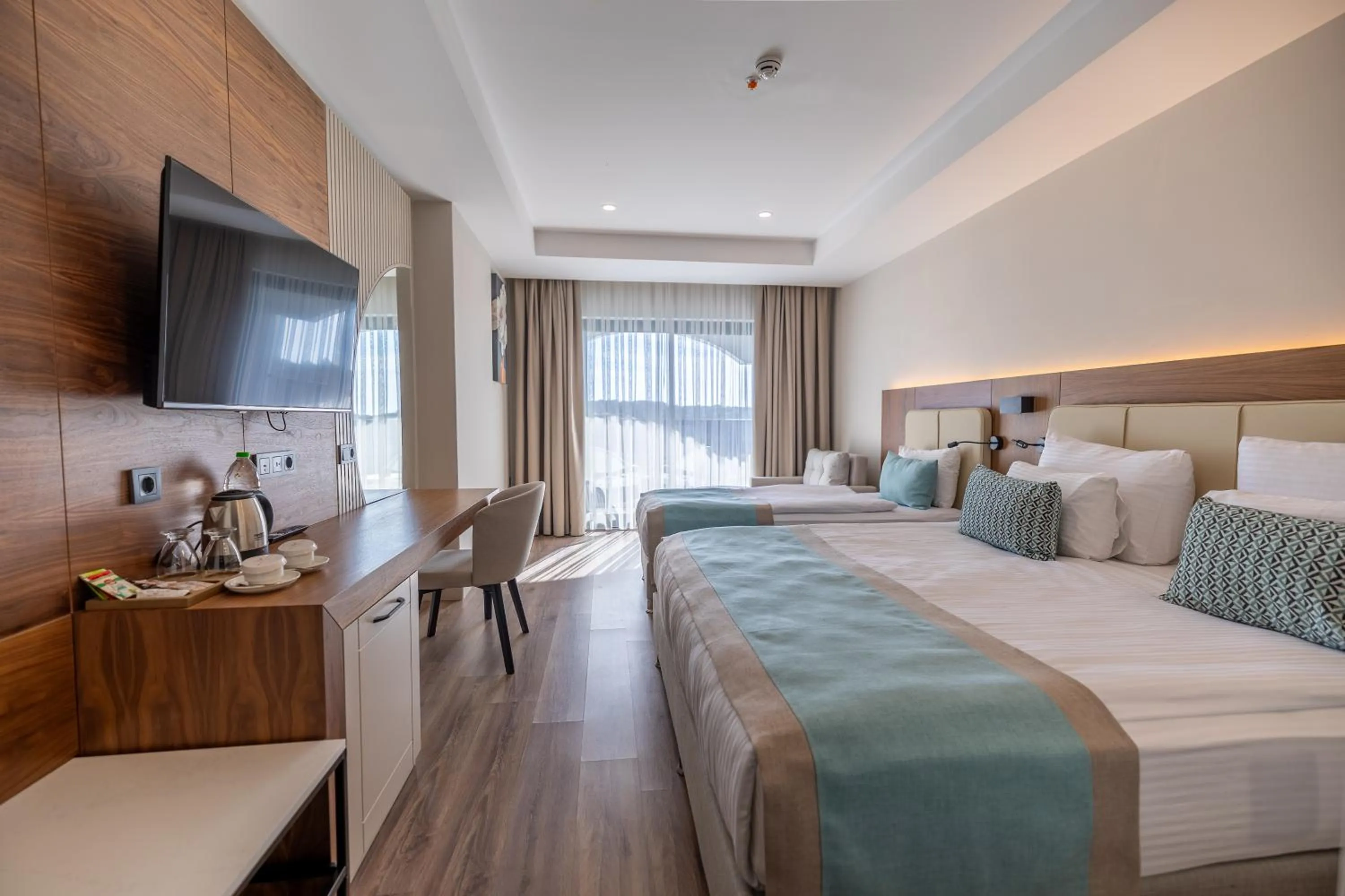 Communal lounge/ TV room, Bed in Side Moon Palace Hotel