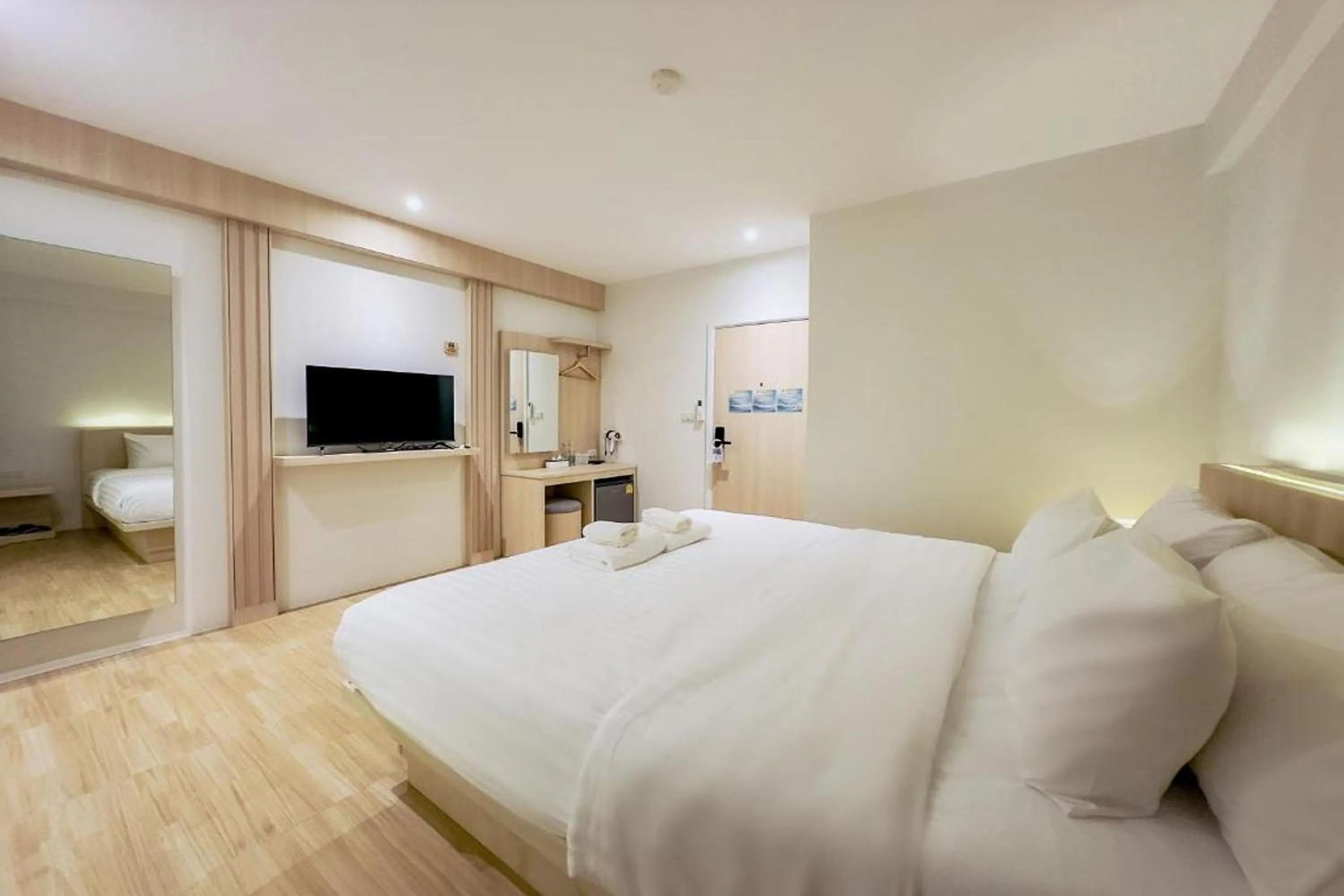 Bed in Zhennan Teabar Hotel