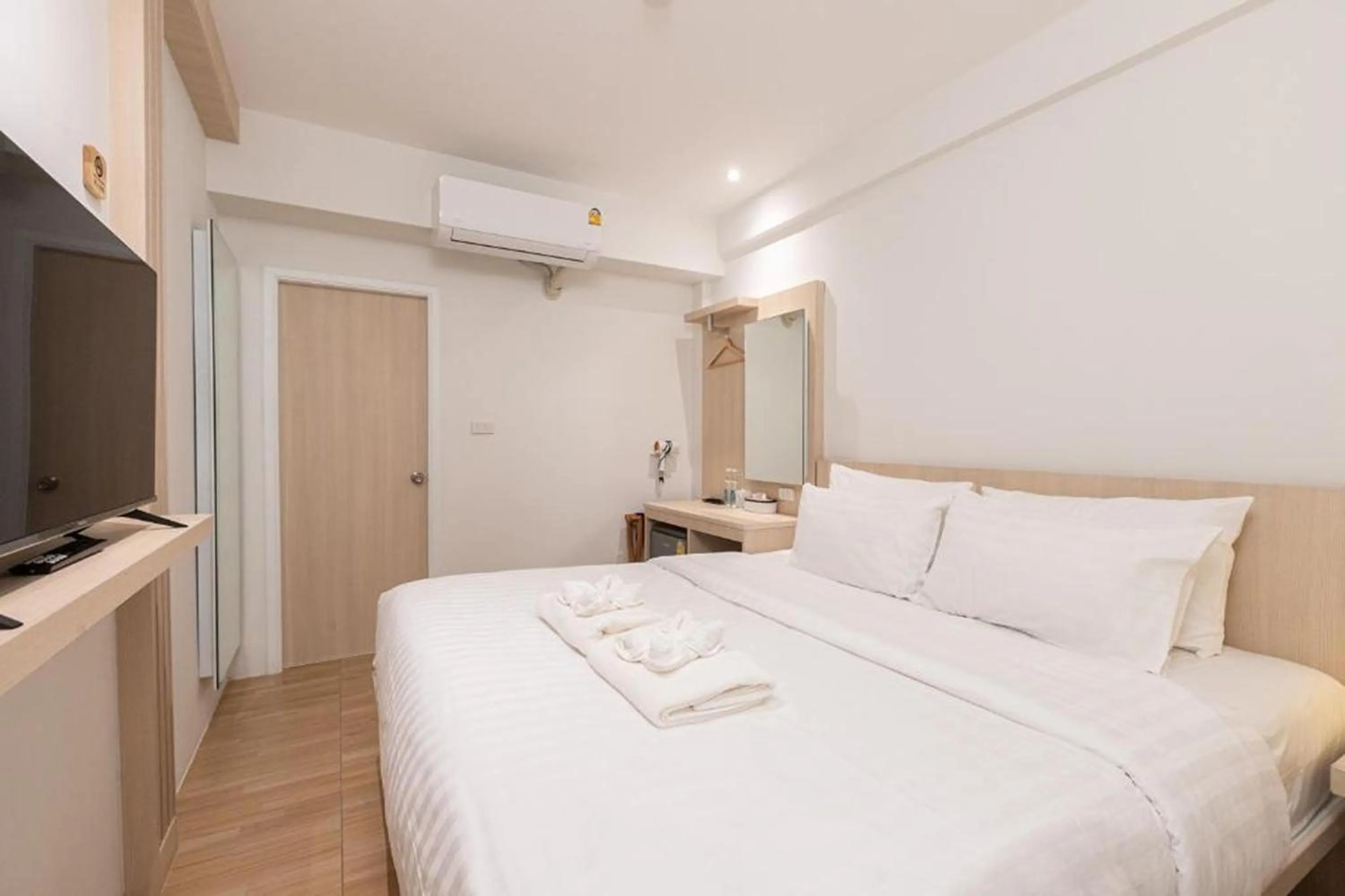 Bed in Zhennan Teabar Hotel