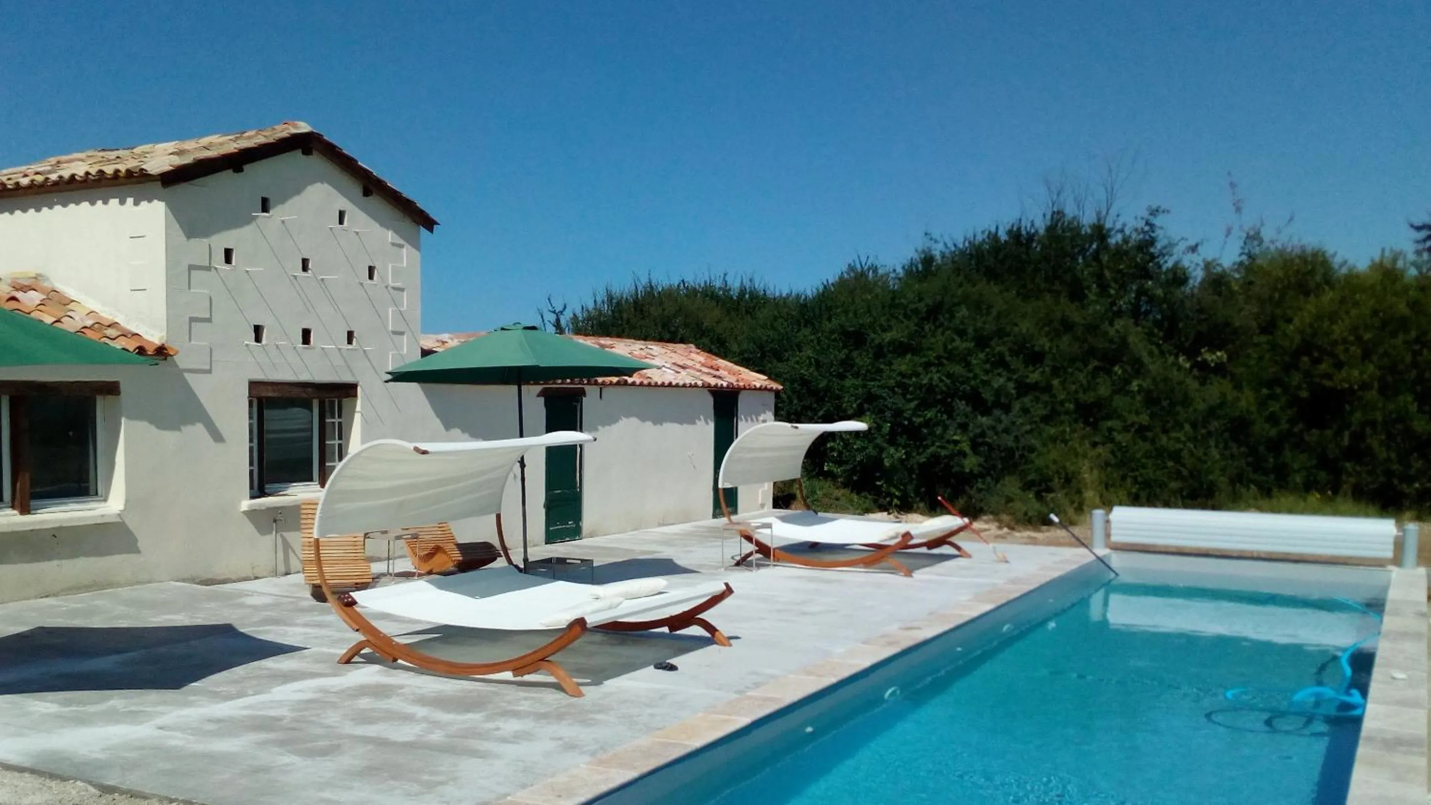 Pool view in Domaine Maison Dodo
