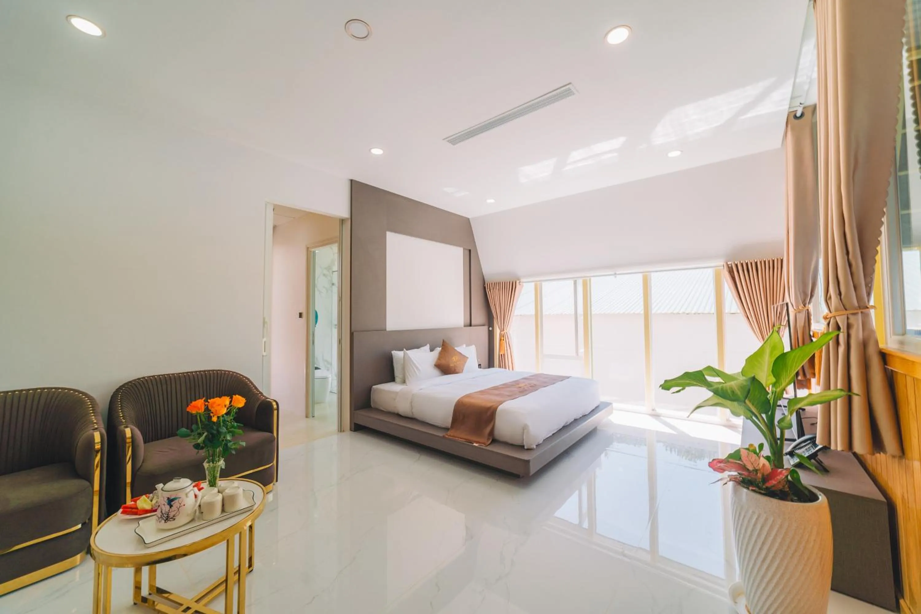 Bed in Quy Tai Premium Hotel