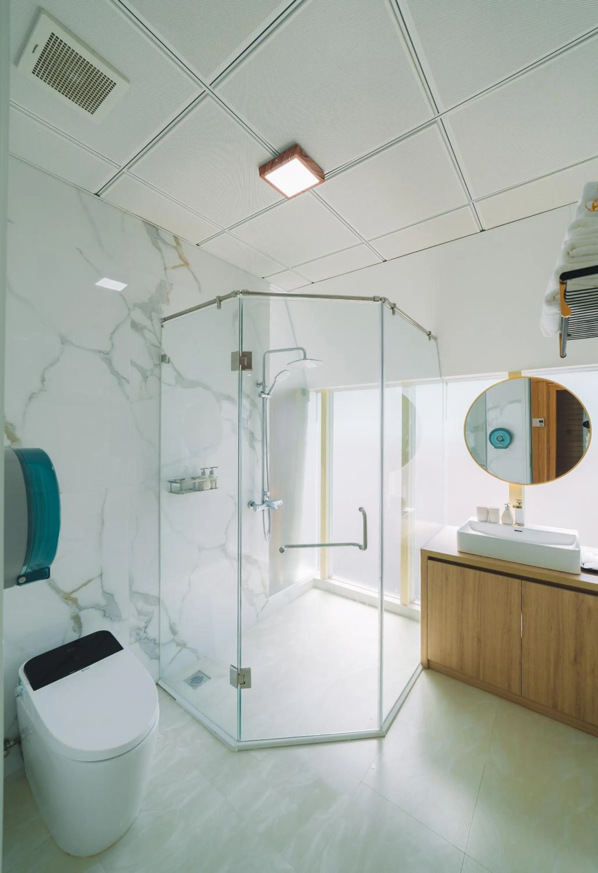 Shower in Quy Tai Premium Hotel