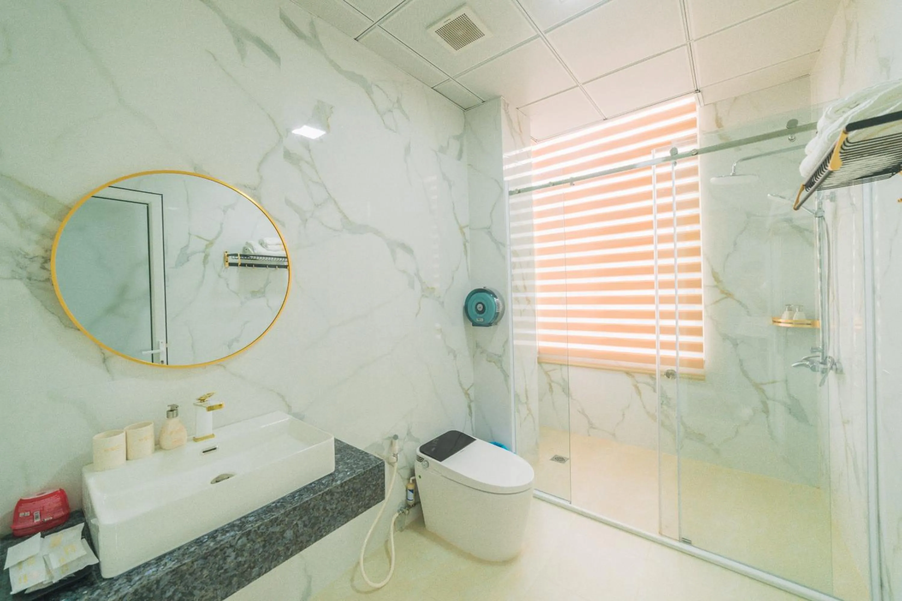 Shower in Quy Tai Premium Hotel