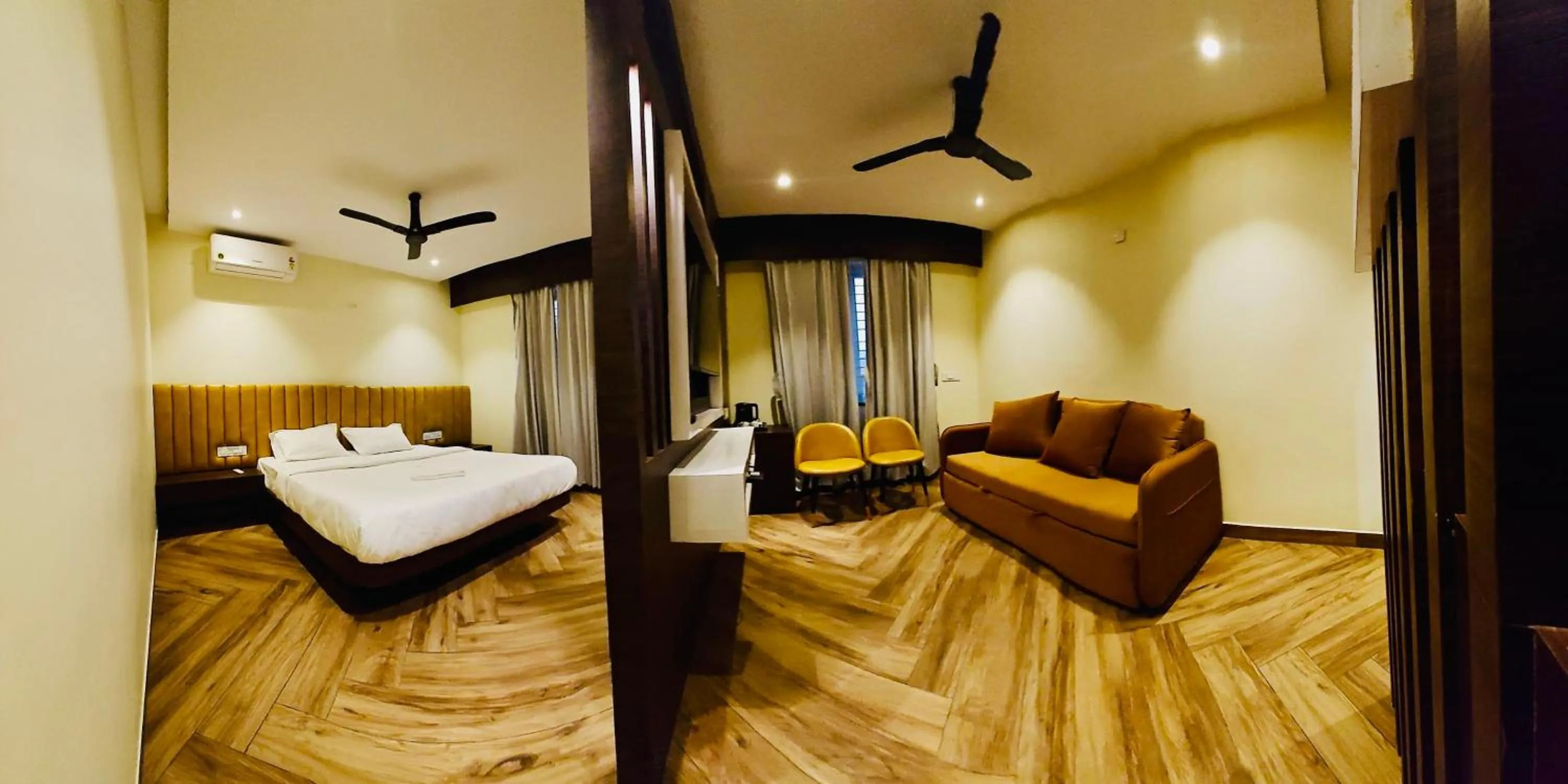 Bed in S K Legacy Hotel