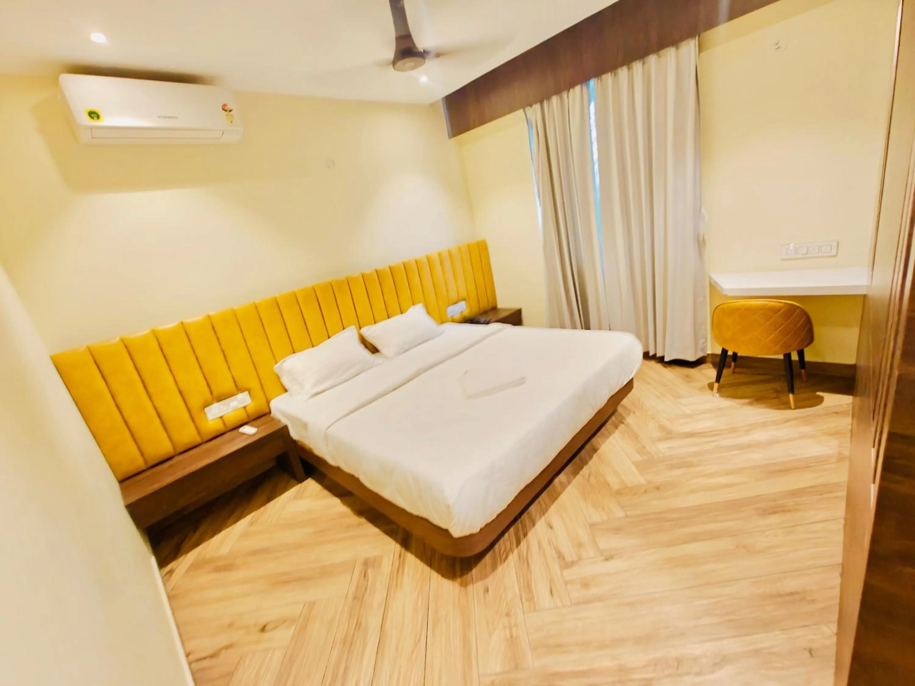 Bed in S K Legacy Hotel