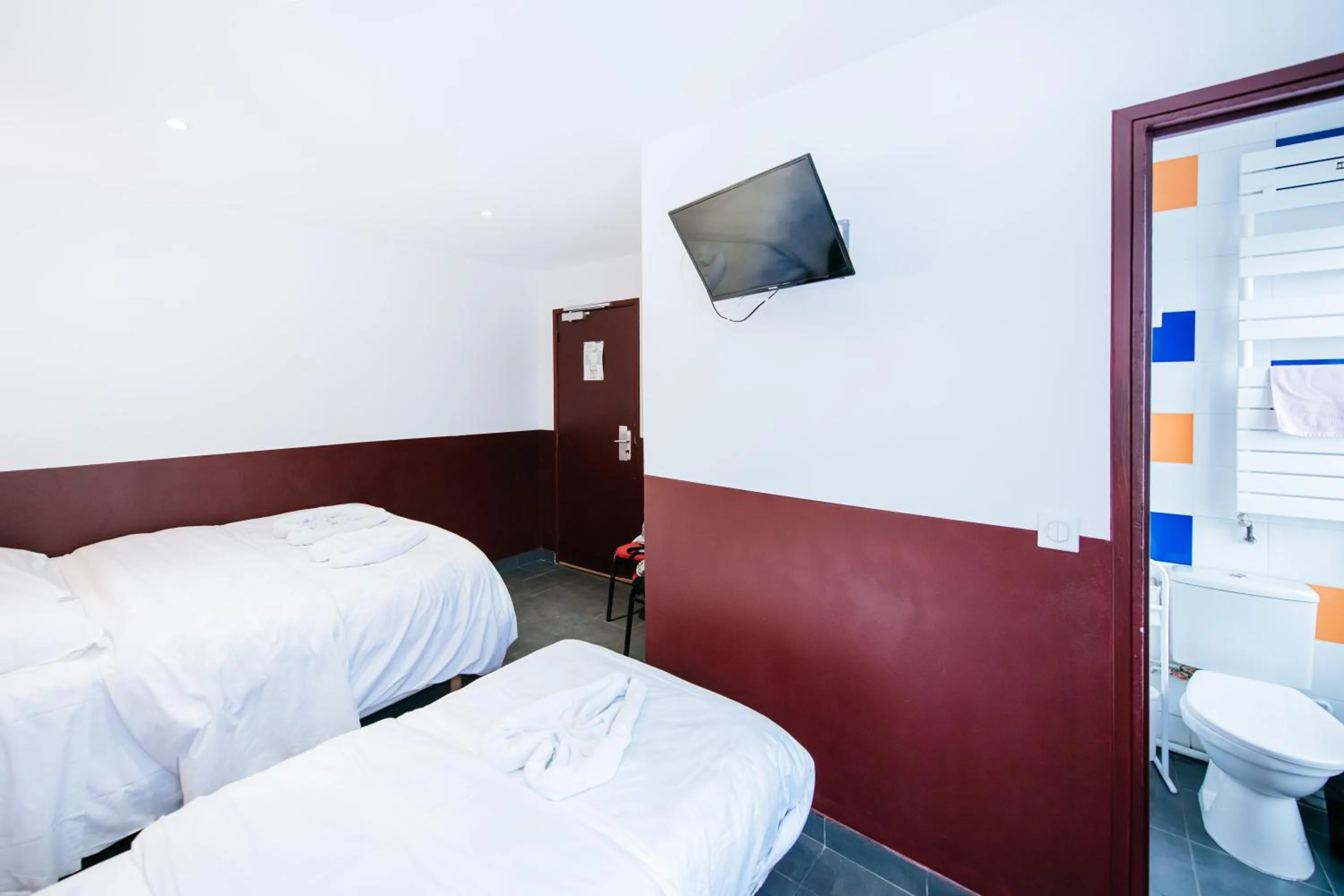 Bed in Hotel De La Poste