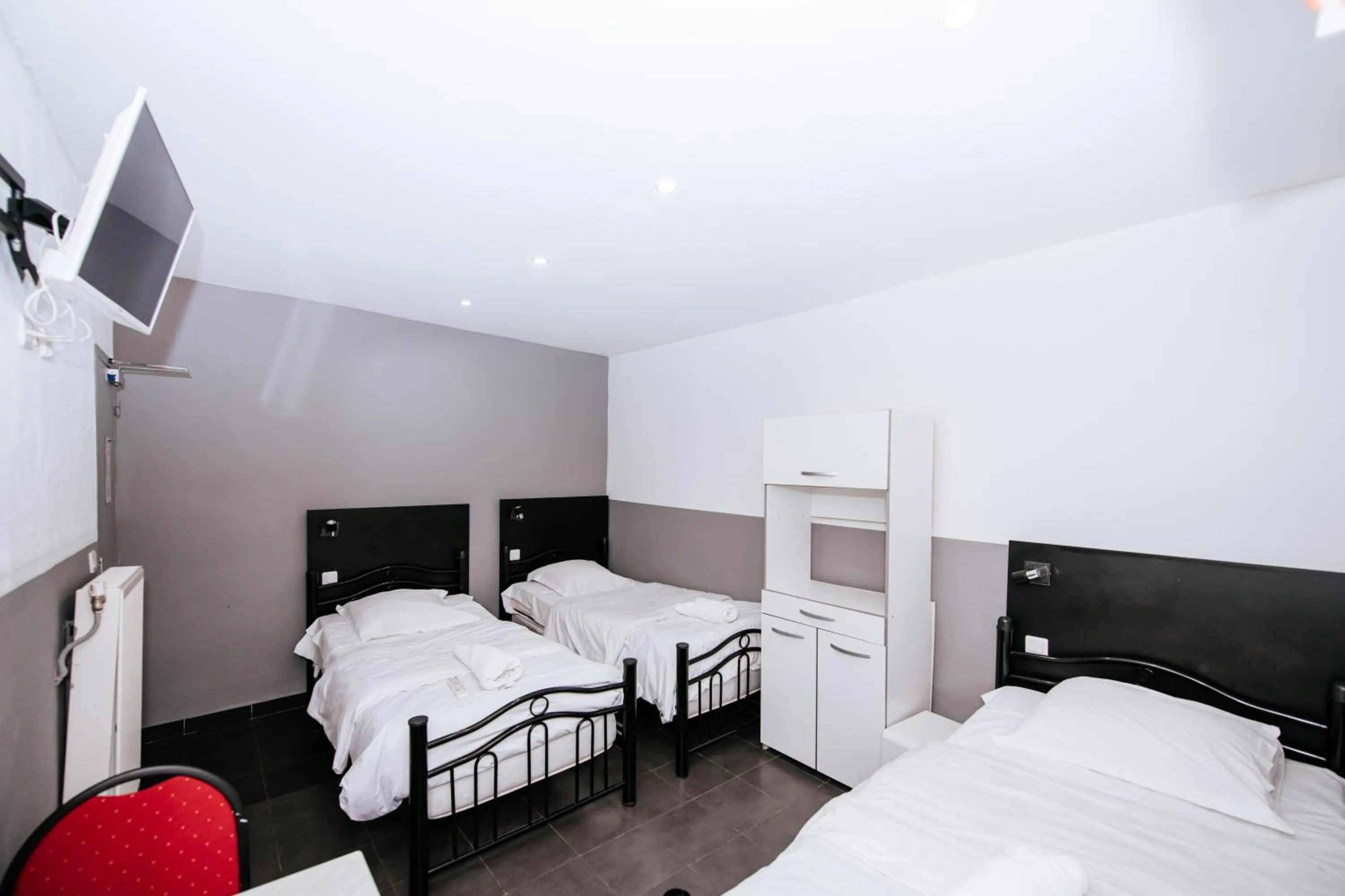 TV and multimedia, Bed in Hotel De La Poste