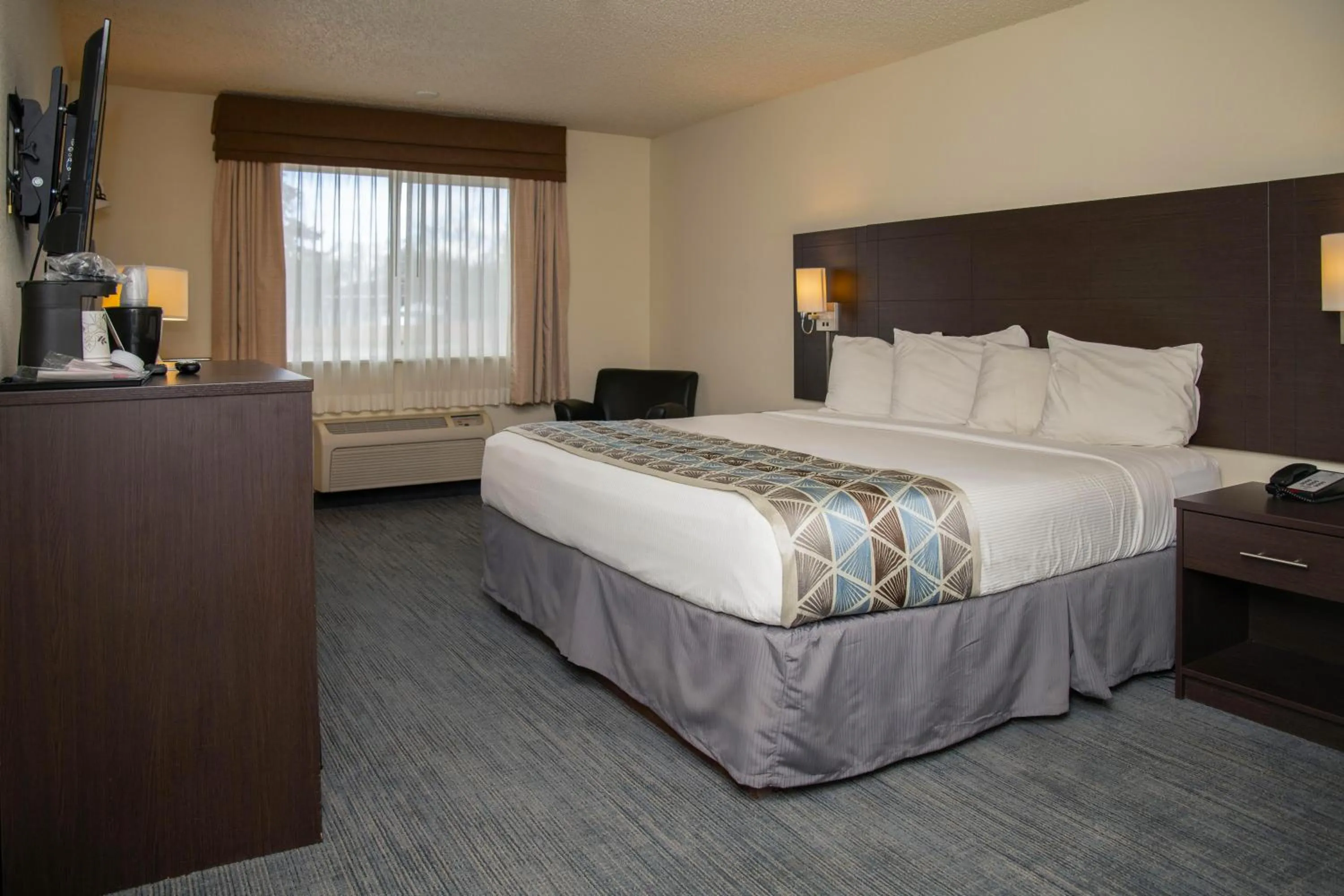 Bedroom, Bed in SureStay Plus by Best Western Montrose