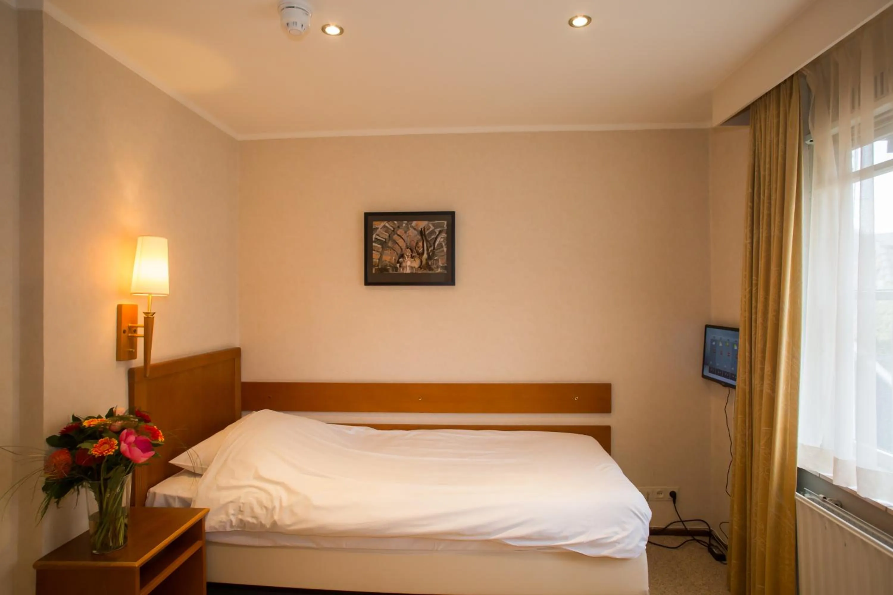 Photo of the whole room, Bed in Landhotel De Hoofdige Boer