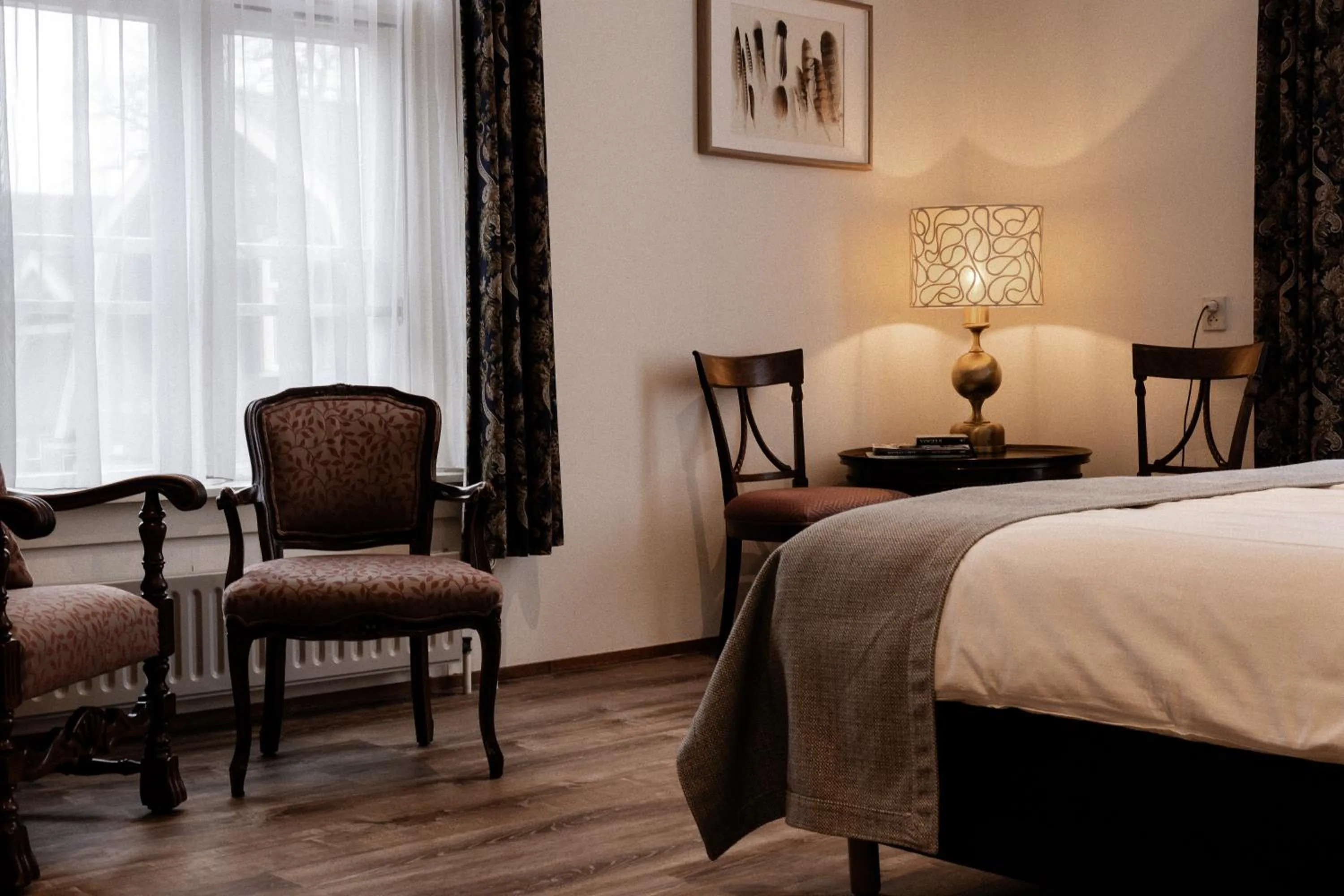 Bed in Landhotel De Hoofdige Boer