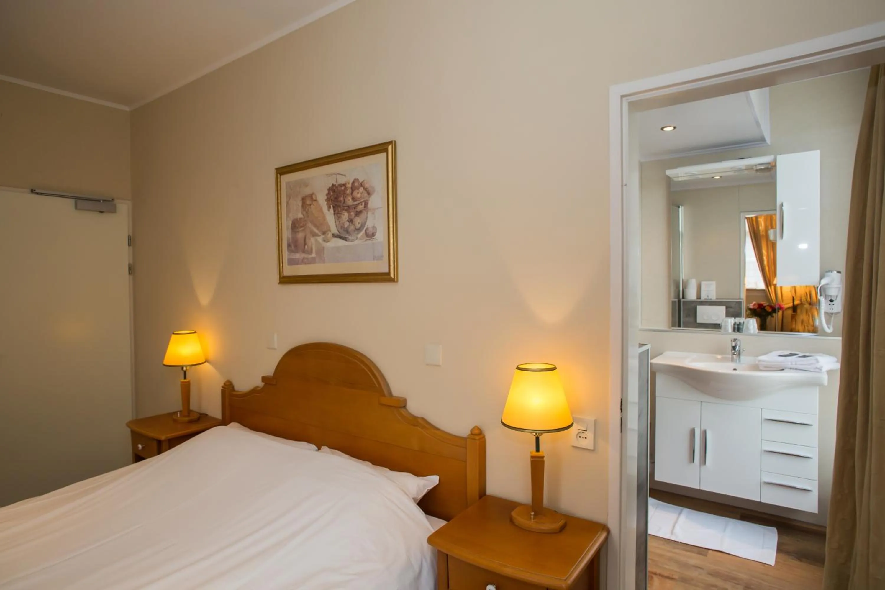 Photo of the whole room, Bed in Landhotel De Hoofdige Boer