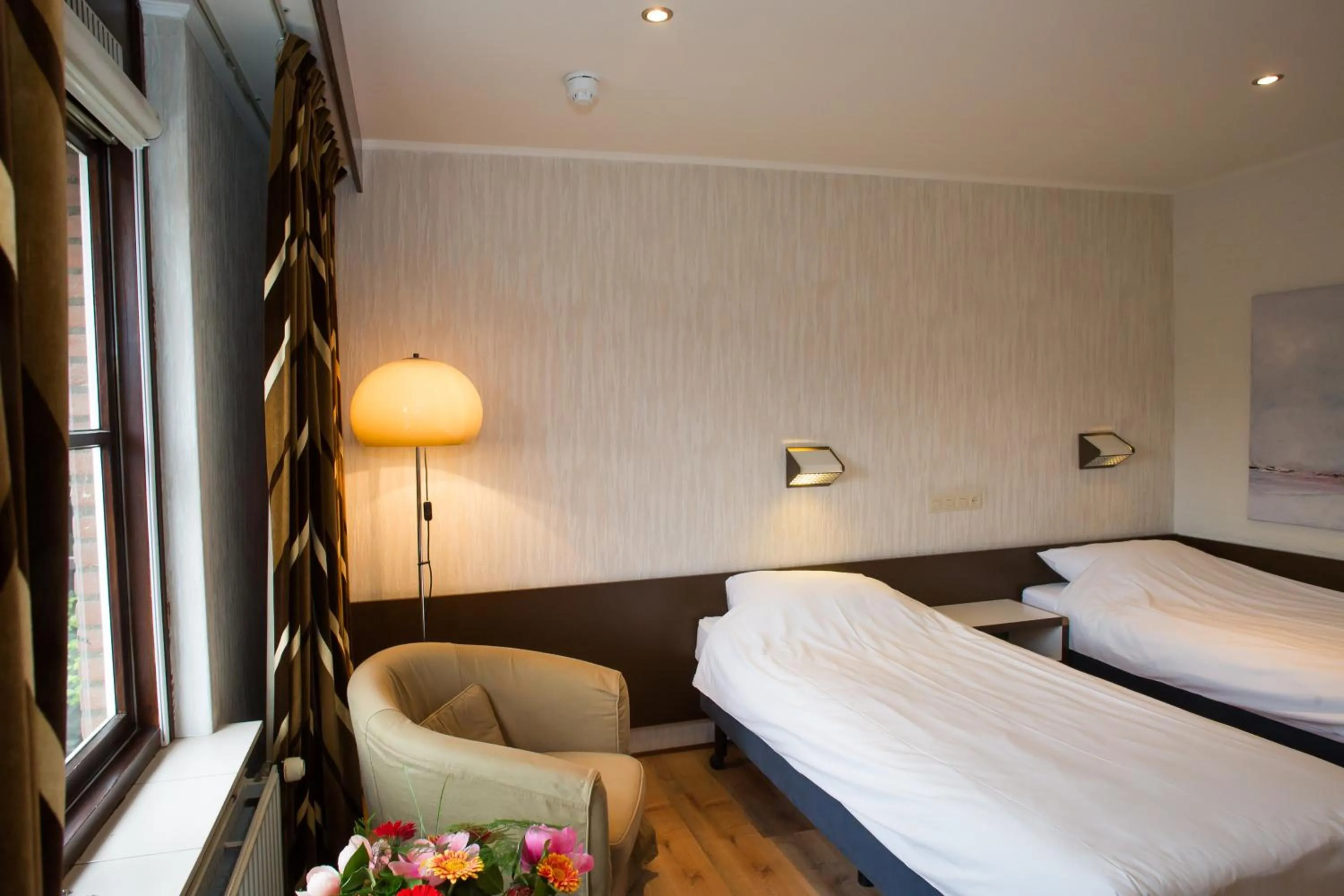 Bed in Landhotel De Hoofdige Boer