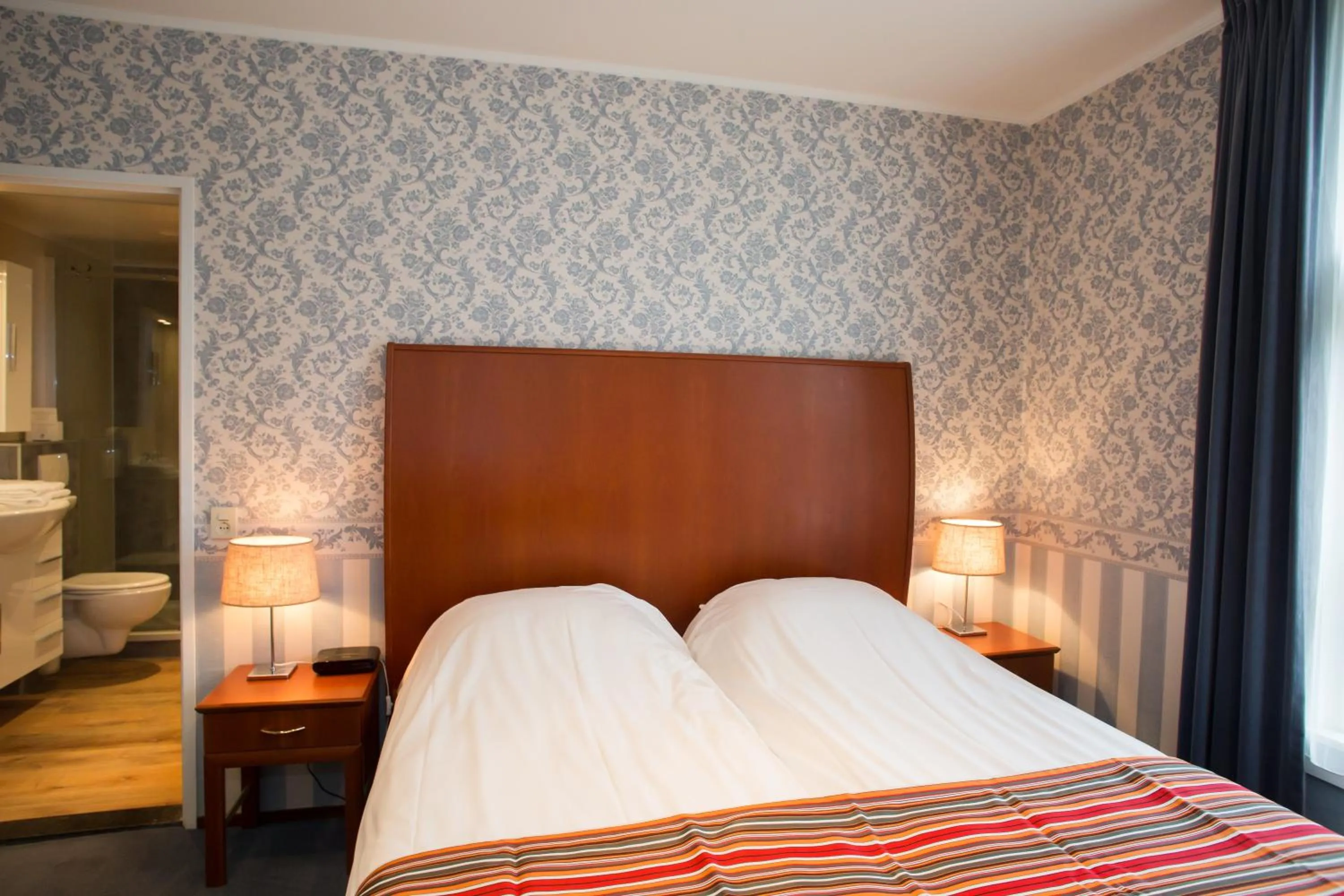Photo of the whole room, Bed in Landhotel De Hoofdige Boer