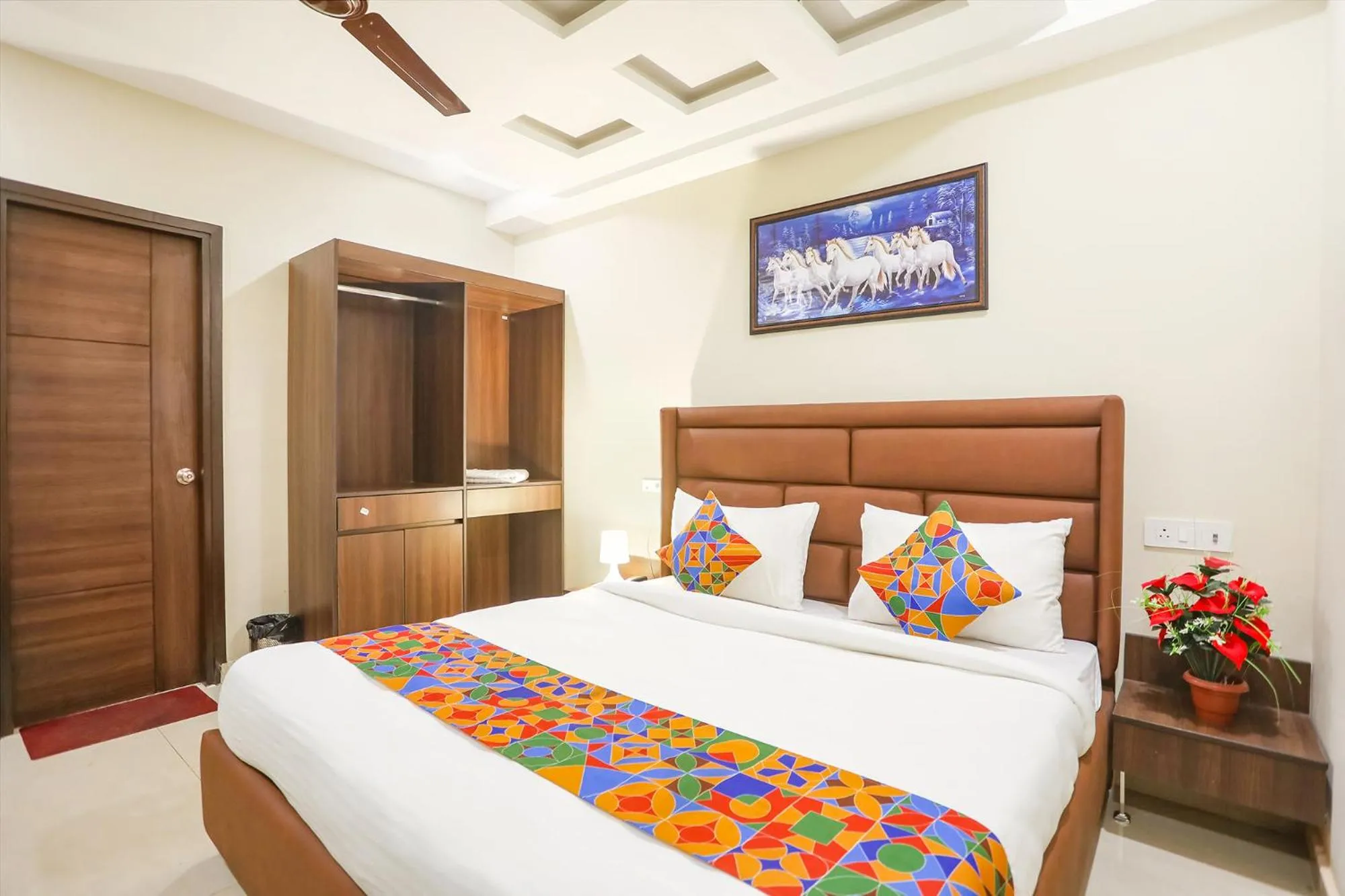 Bed in FabHotel Nirvana Residency