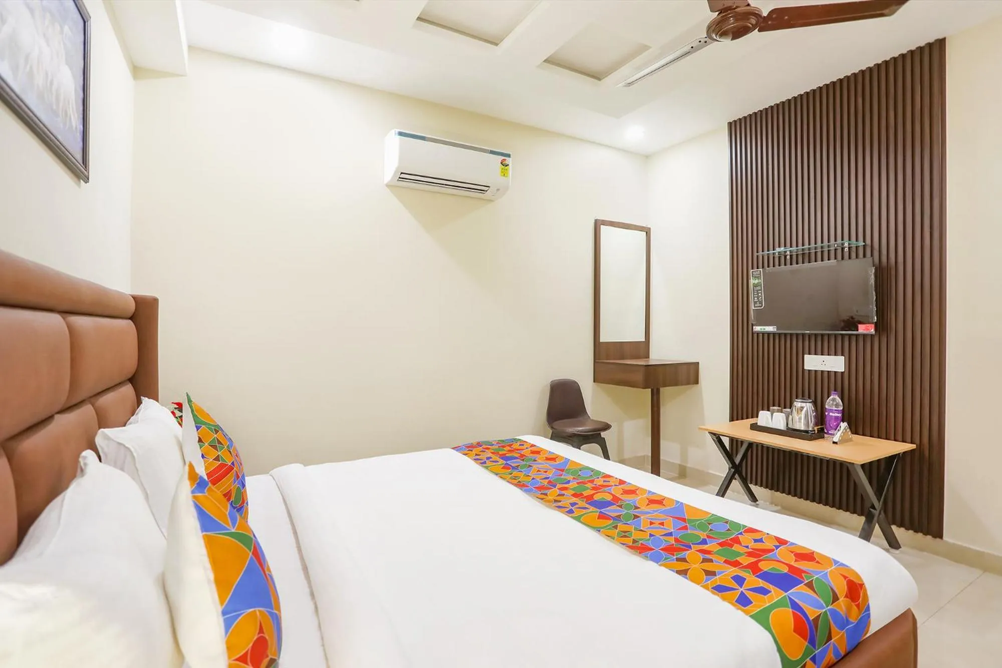 Bed in FabHotel Nirvana Residency