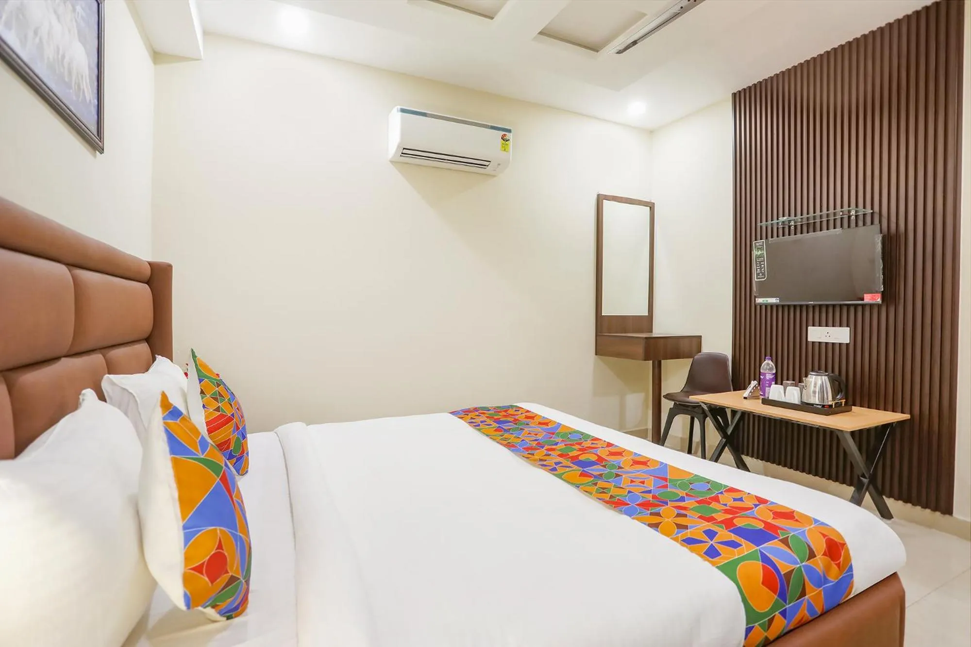 Bed in FabHotel Nirvana Residency