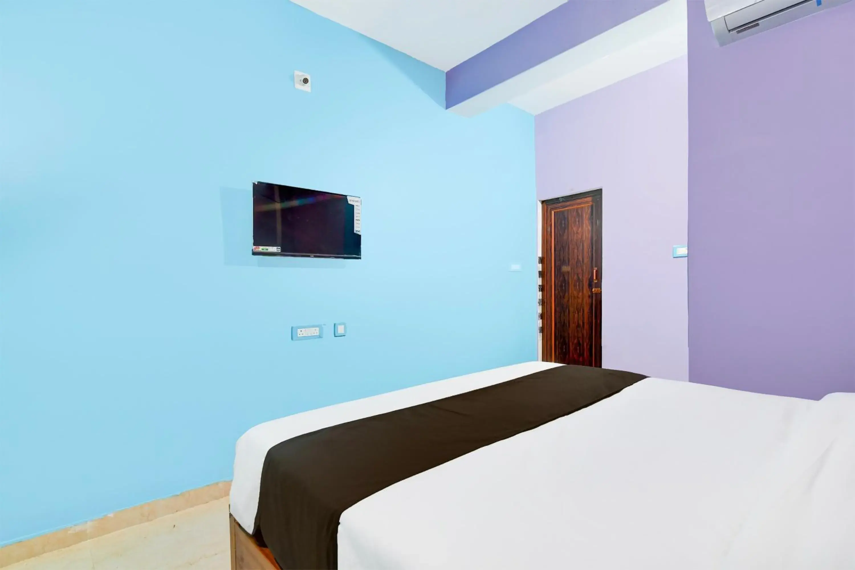 Deluxe Triple Room - single occupancy in Hotel O Blue Valley Deluxe Triple Room - single occupancy in Hotel O Blue Valley