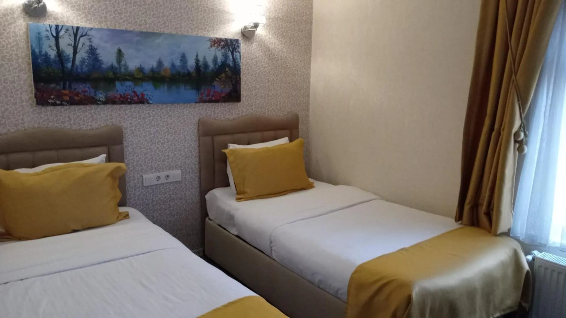 Bed in ANGRAND HOTEL