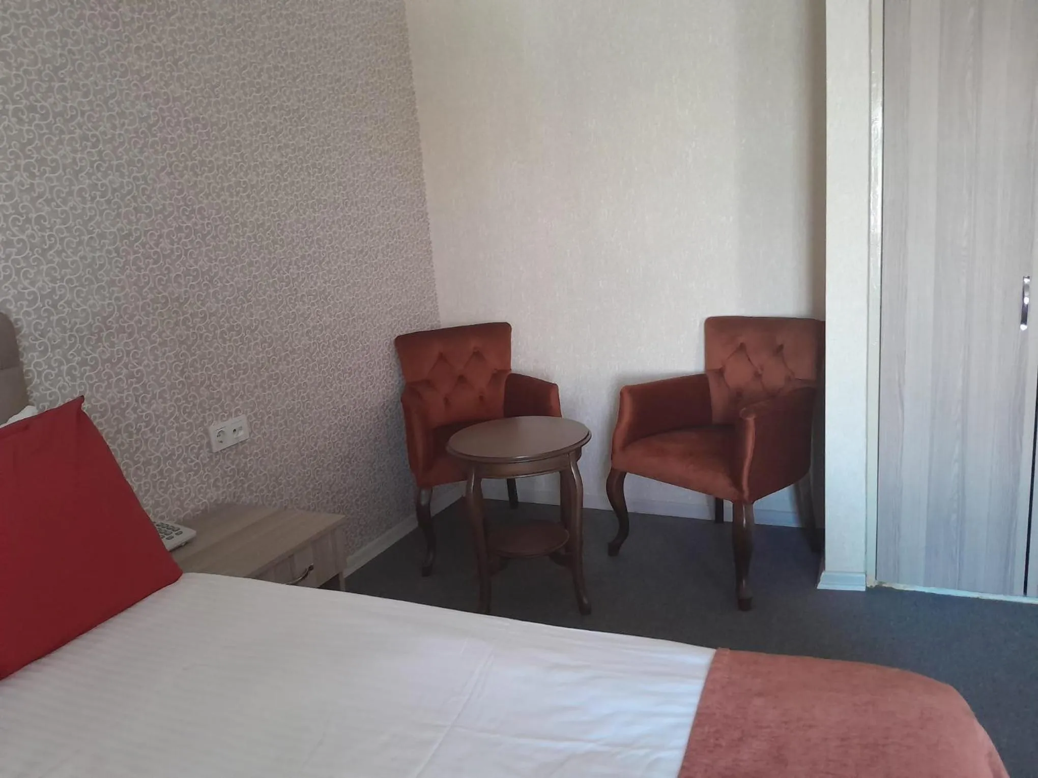 Living room, Bed in ANGRAND HOTEL