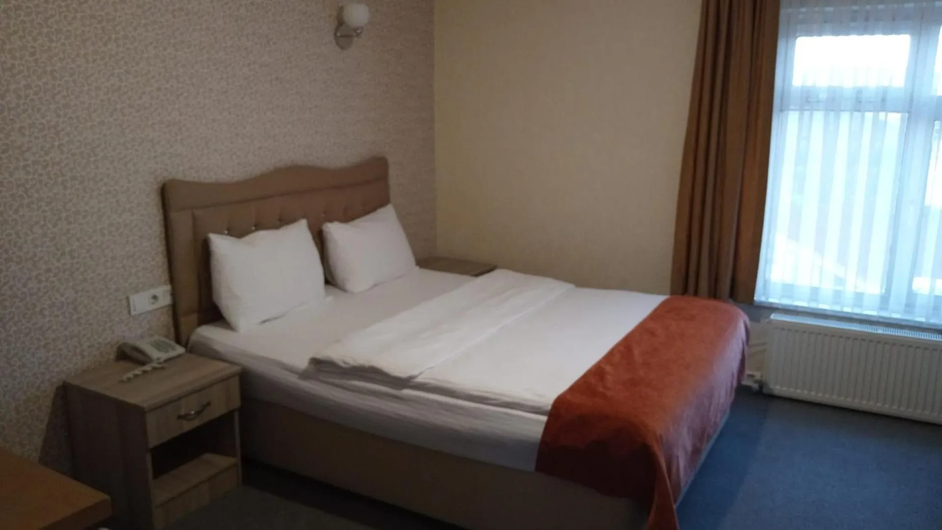 Bed in ANGRAND HOTEL