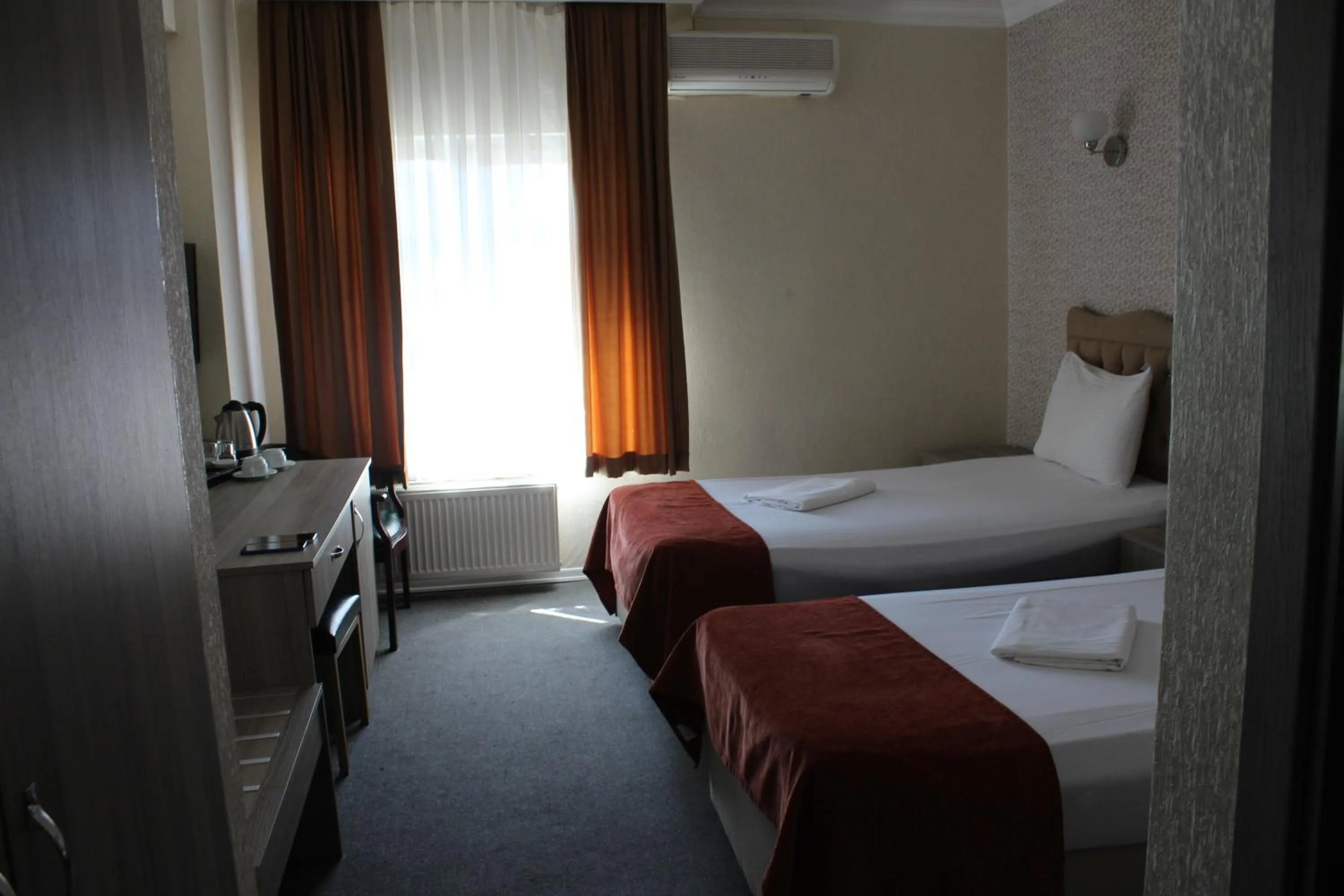 Bed in ANGRAND HOTEL