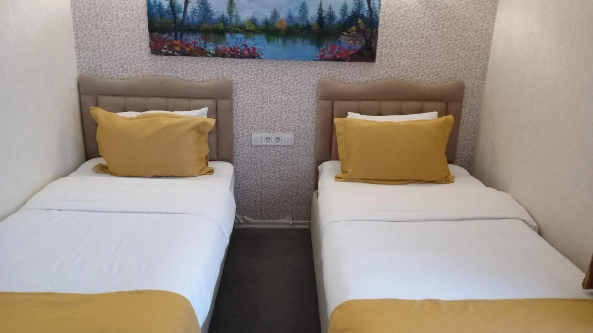 Bed in ANGRAND HOTEL