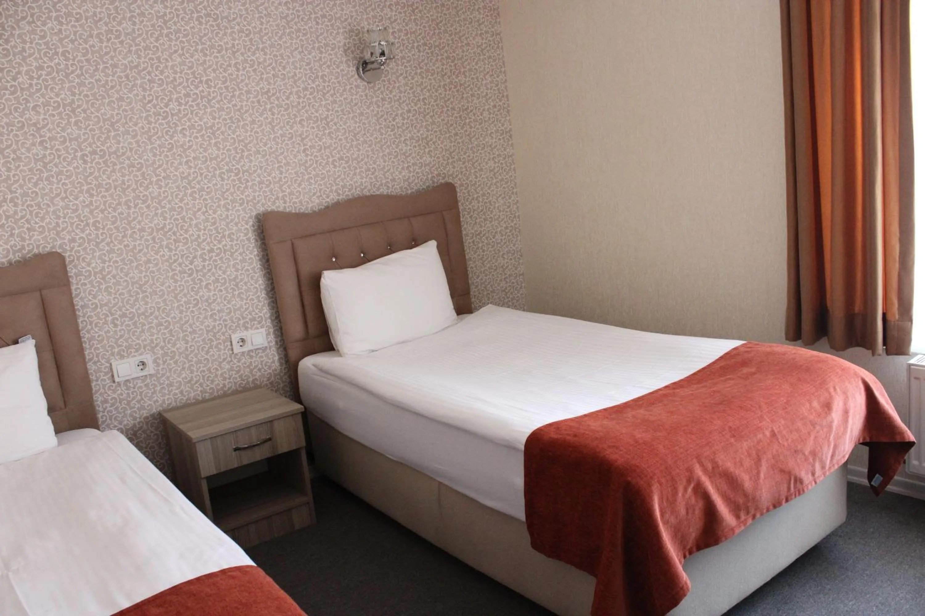 Bed in ANGRAND HOTEL