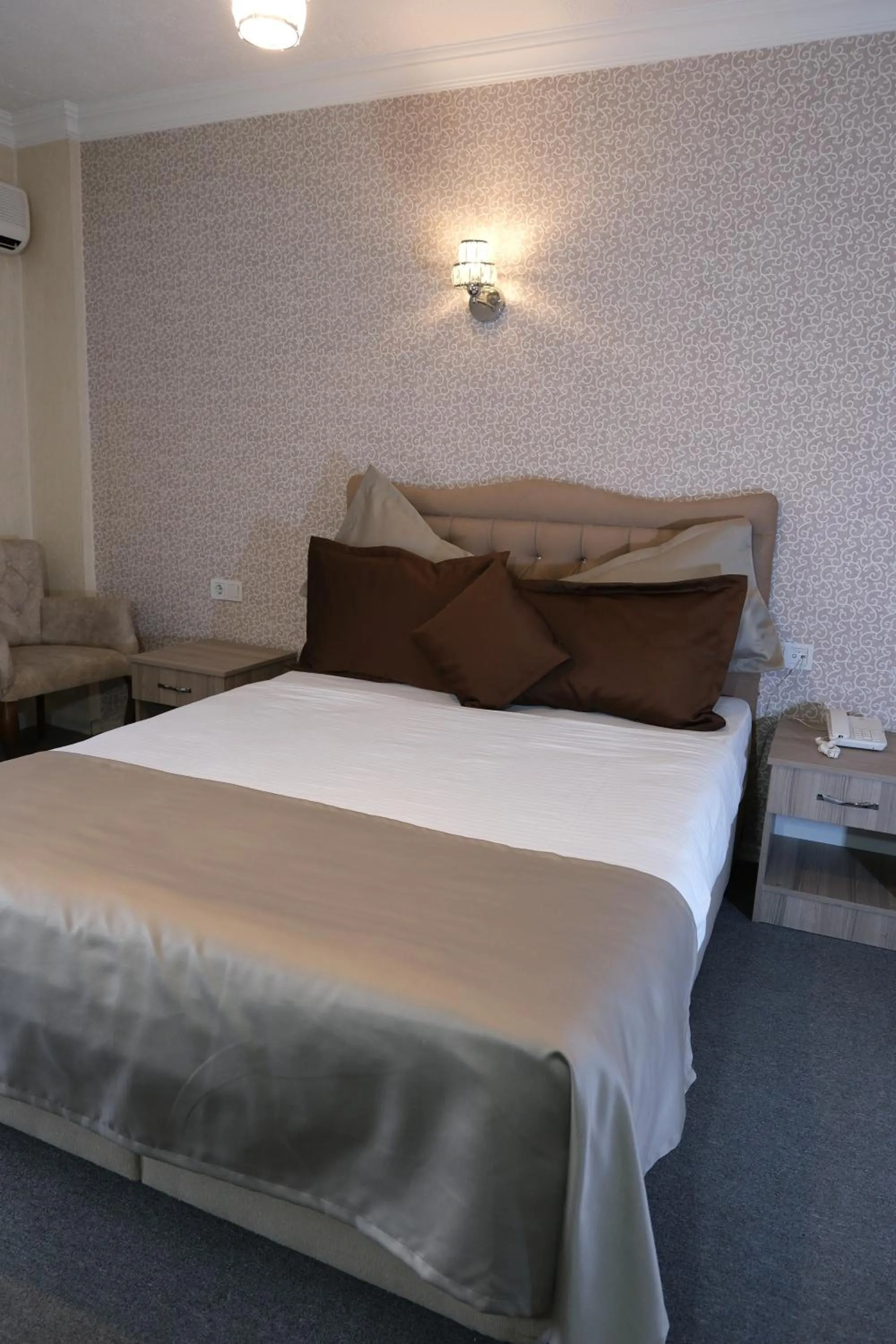 Bed in ANGRAND HOTEL