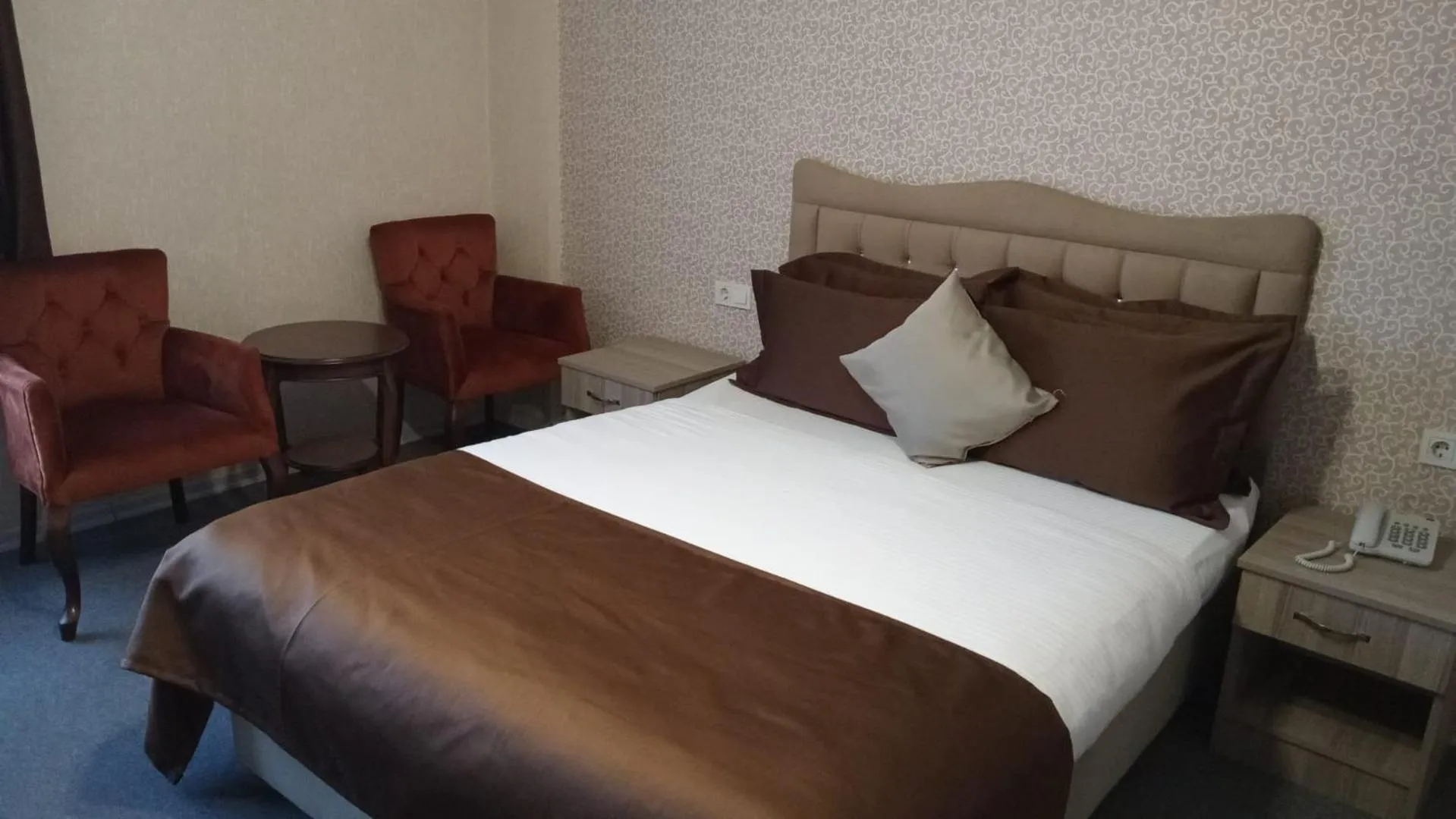 Bed in ANGRAND HOTEL