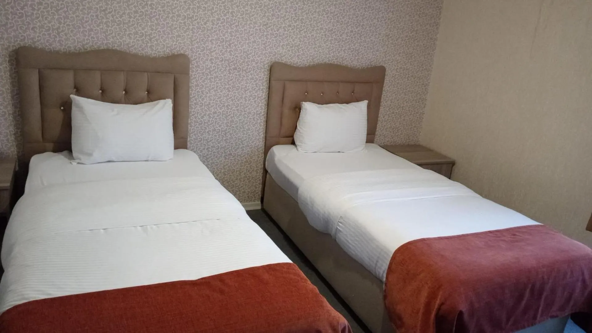 Bed in ANGRAND HOTEL