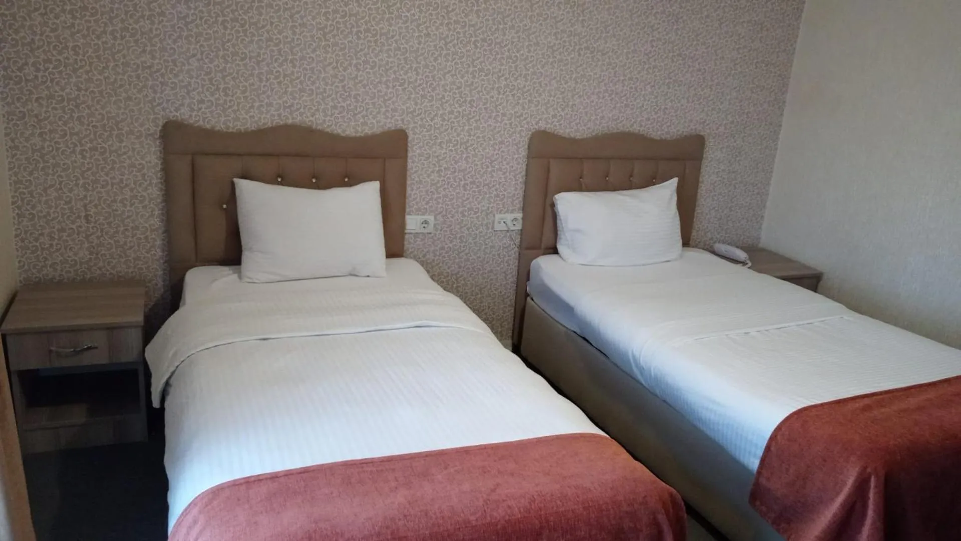 Bed in ANGRAND HOTEL