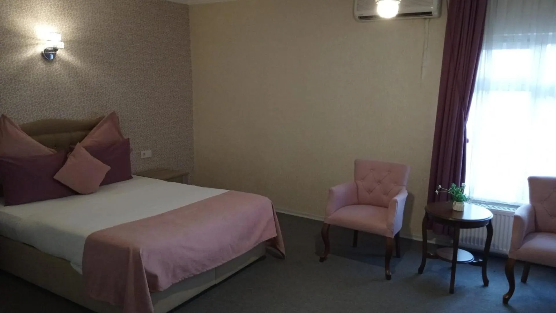 Bed in ANGRAND HOTEL